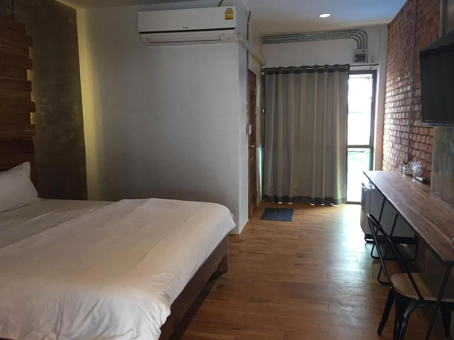 Photo of the whole room, Bed in De Nan Hotel