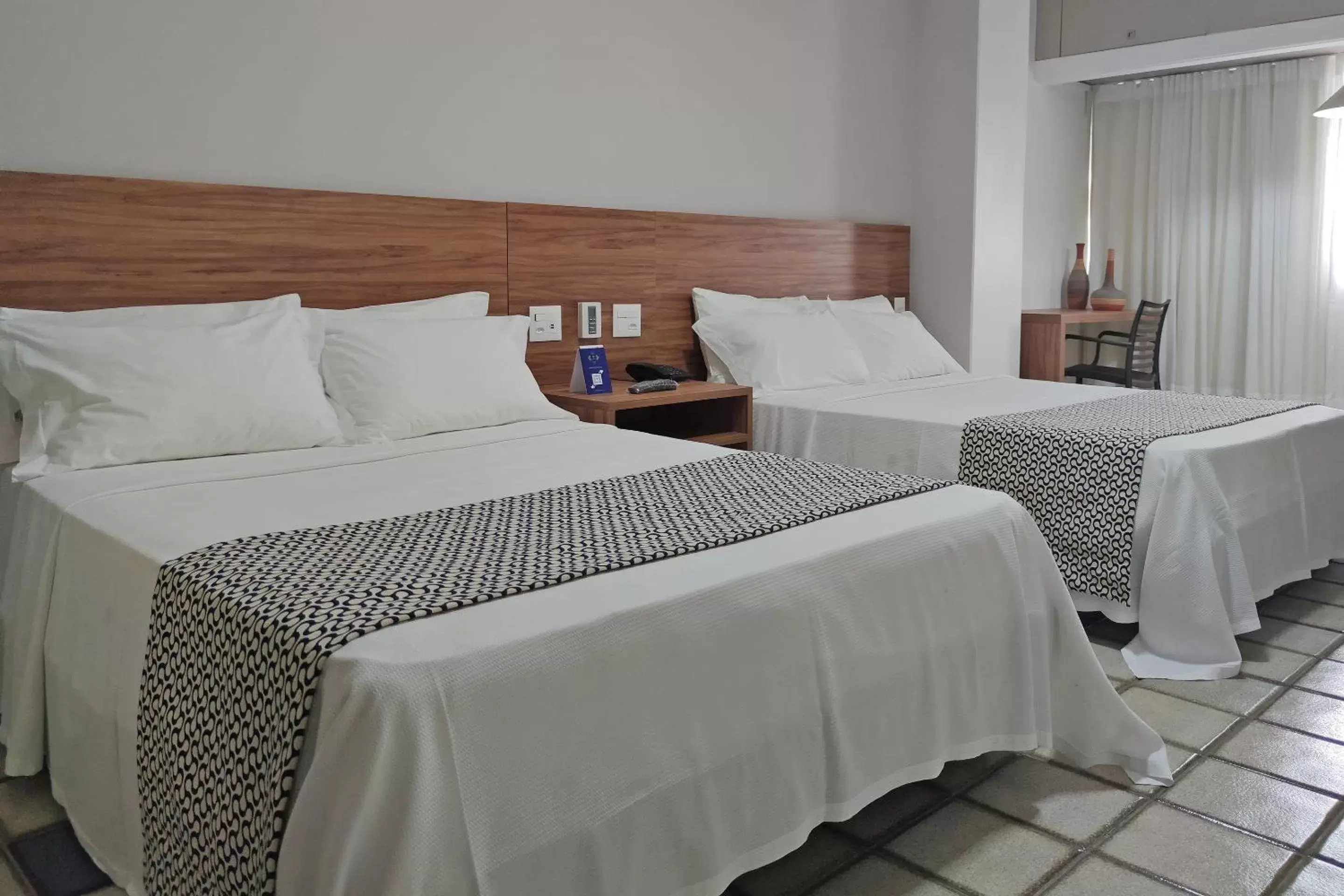 Bed in Fiesta Bahia Hotel
