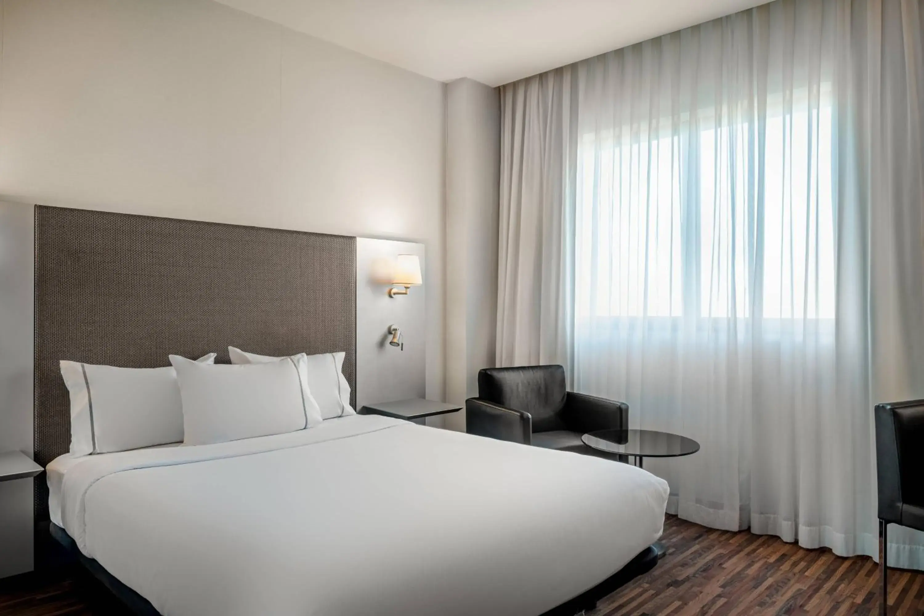 Photo of the whole room, Bed in AC Hotel Gijón by Marriott