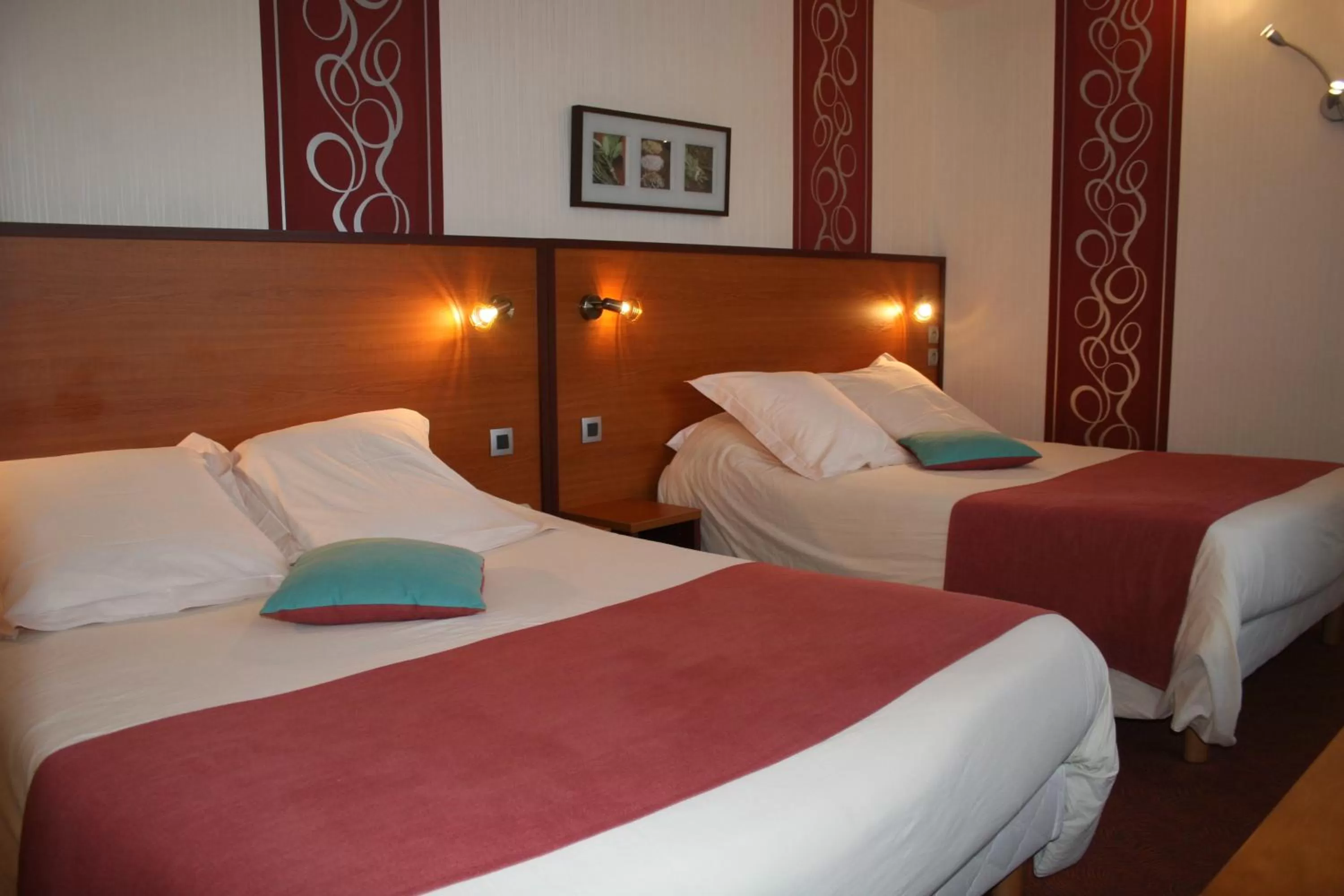 Quadruple Room in Cit'Hotel Capricorne