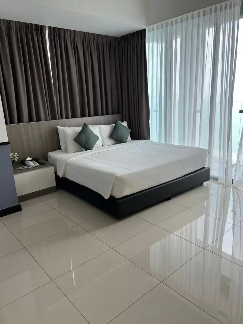 Bed in D'Wharf Hotel & Serviced Residence