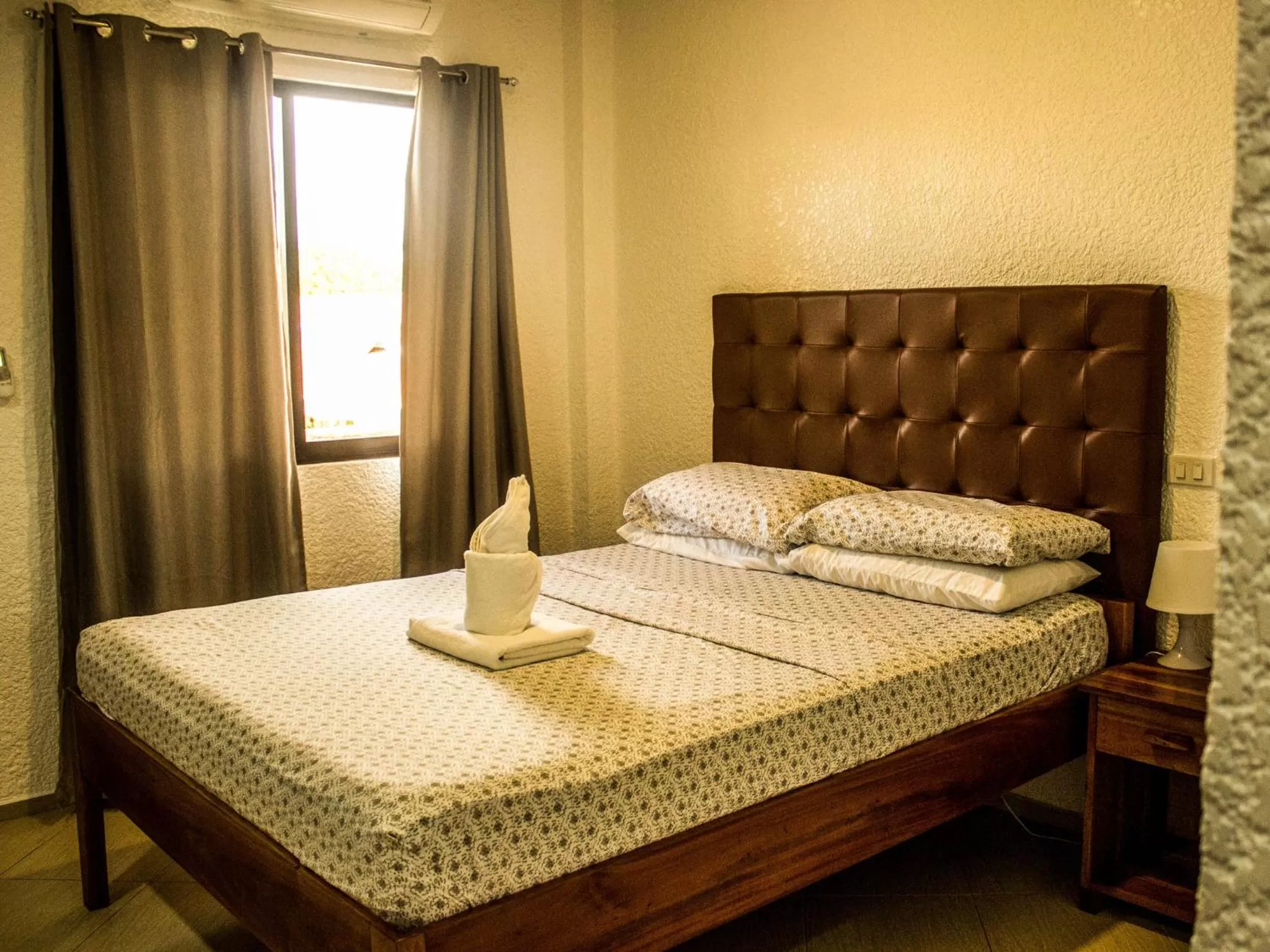 Bed in Jugalis Hotel and Restaurant
