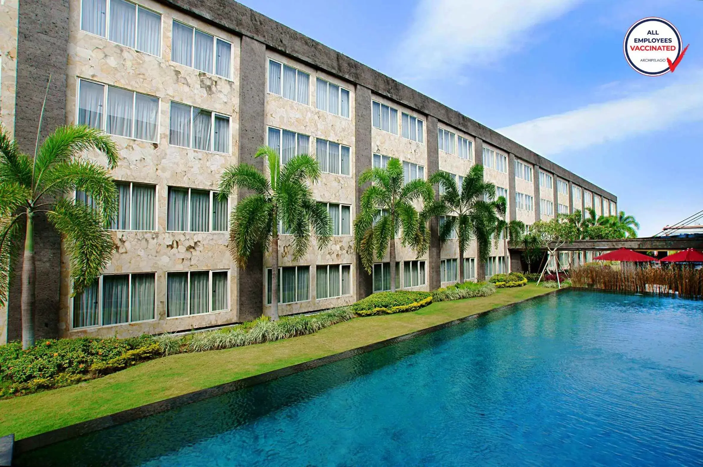 Swimming pool, Property Building in ASTON Denpasar Hotel & Convention
