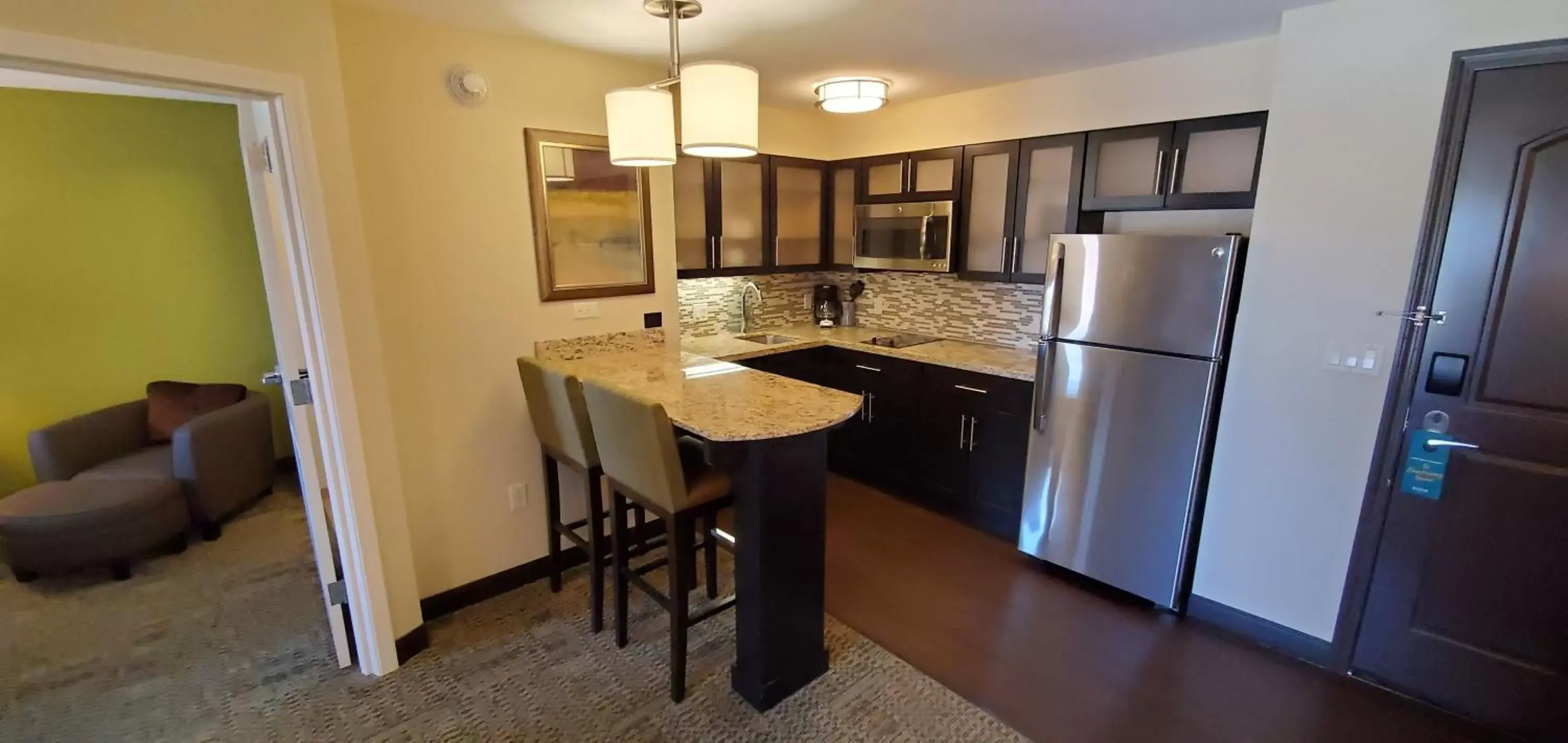 Photo of the whole room, Kitchen/Kitchenette in Staybridge Suites Eau Claire - Altoona, an IHG Hotel