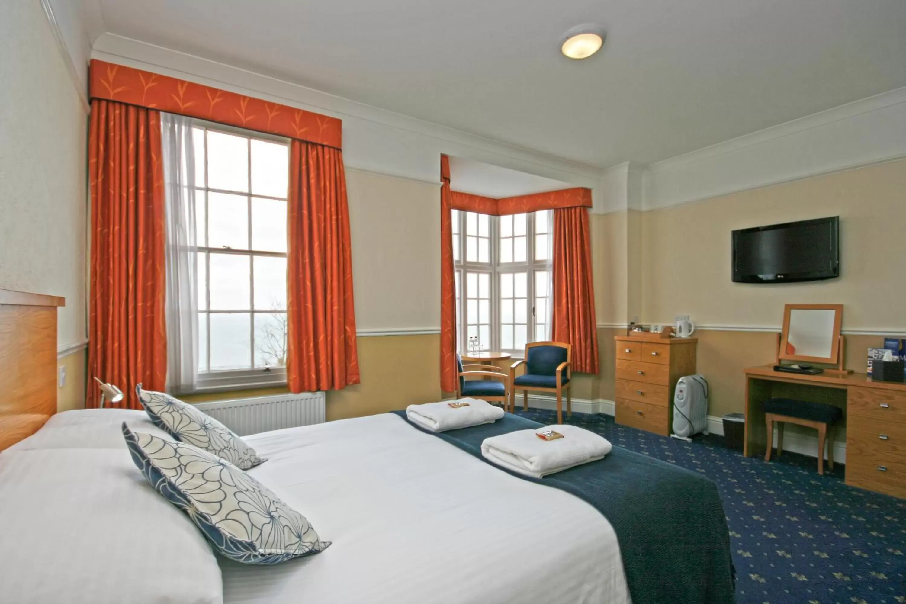 Bedroom, TV/Entertainment Center in Babbacombe Royal Hotel and Carvery