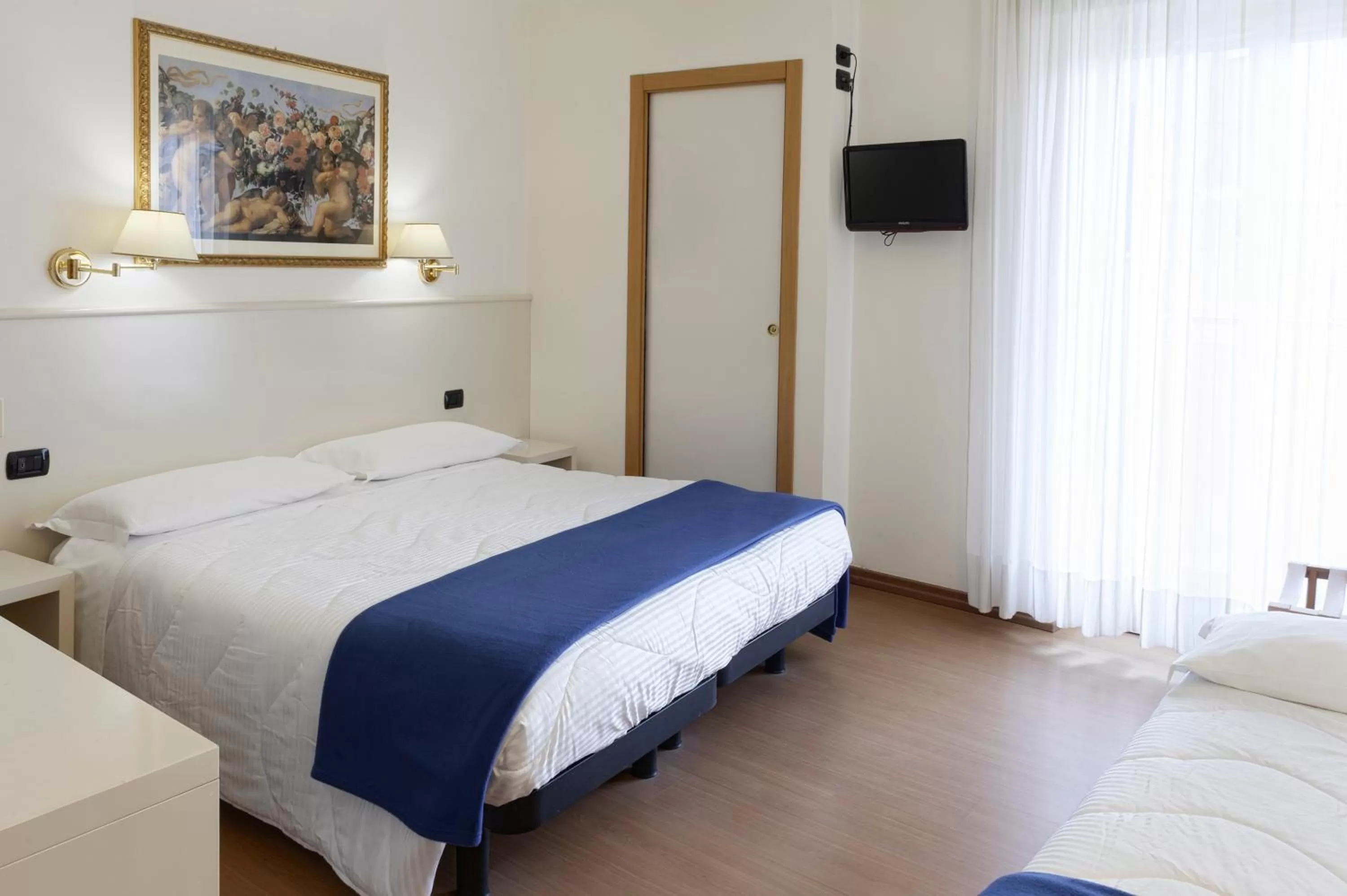 Photo of the whole room, Bed in Hotel International