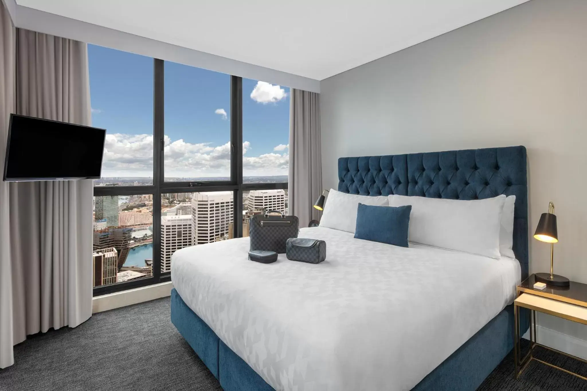 Bed in Meriton Suites Pitt Street, Sydney