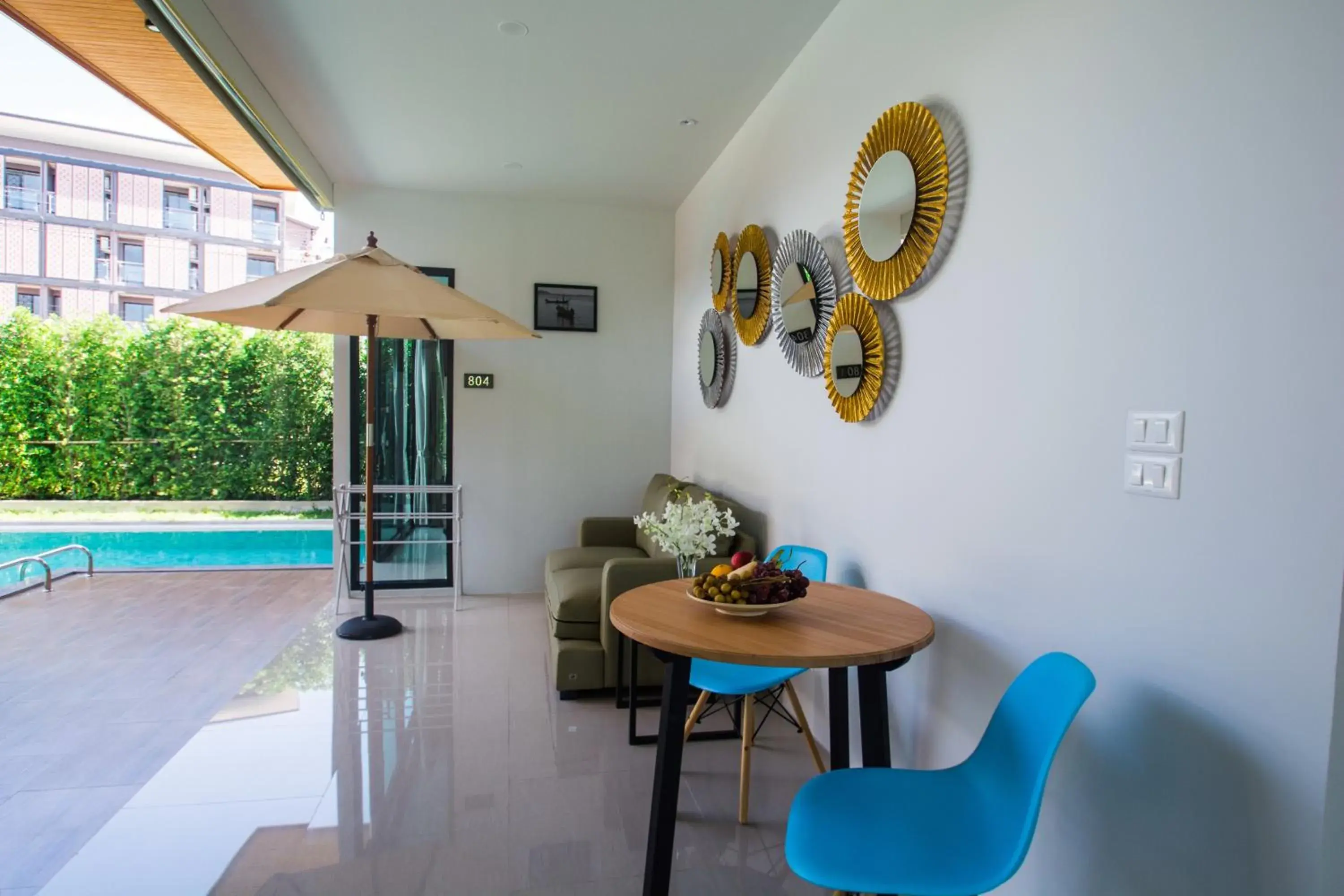 Living room in Good Night Pool Villa Phuket - SHA Plus Living room in Good Night Pool Villa Phuket - SHA Plus