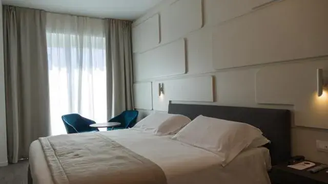 Photo of the whole room, Bed in Solho Hotel