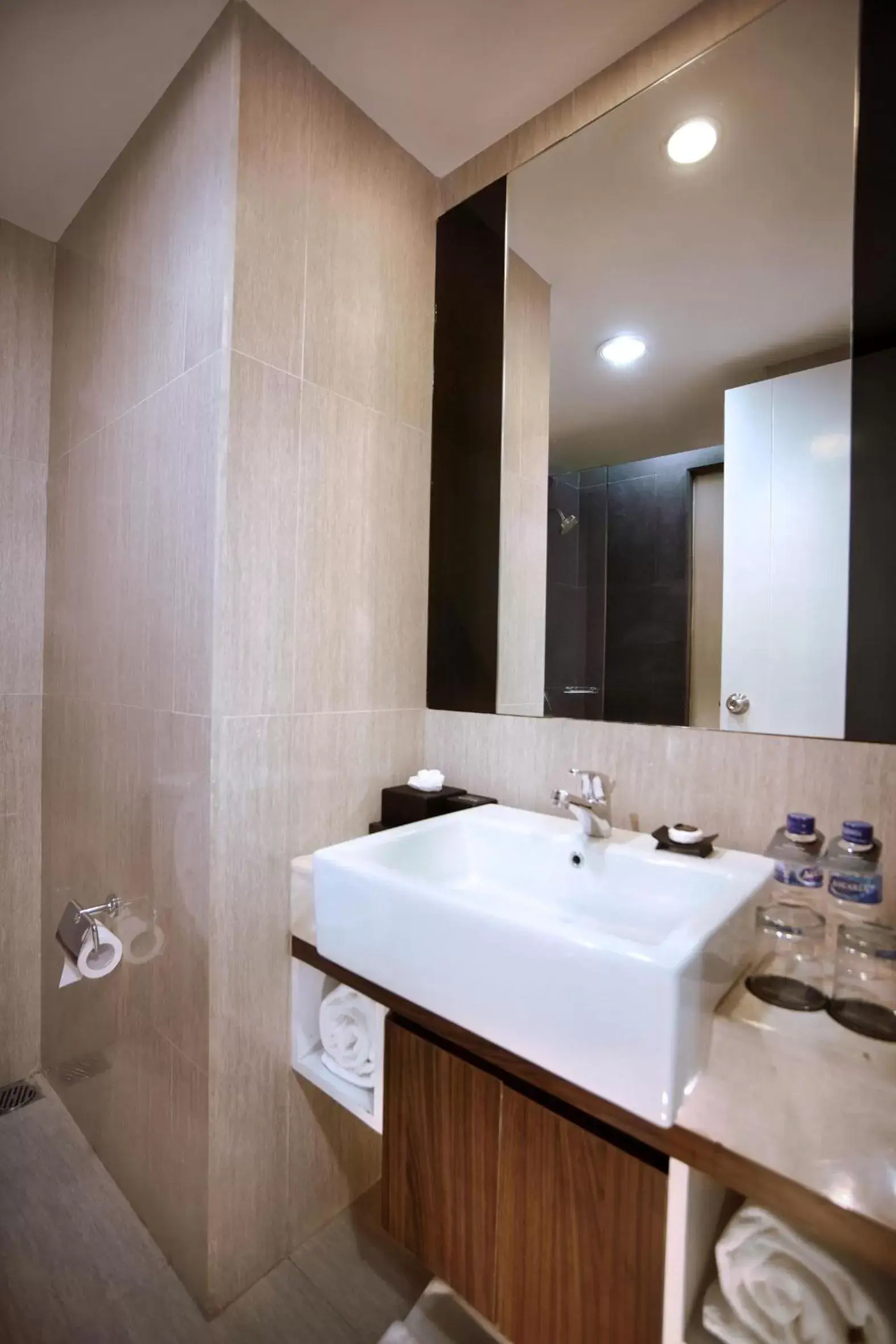 Bathroom in Neo Hotel Mangga Dua by ASTON