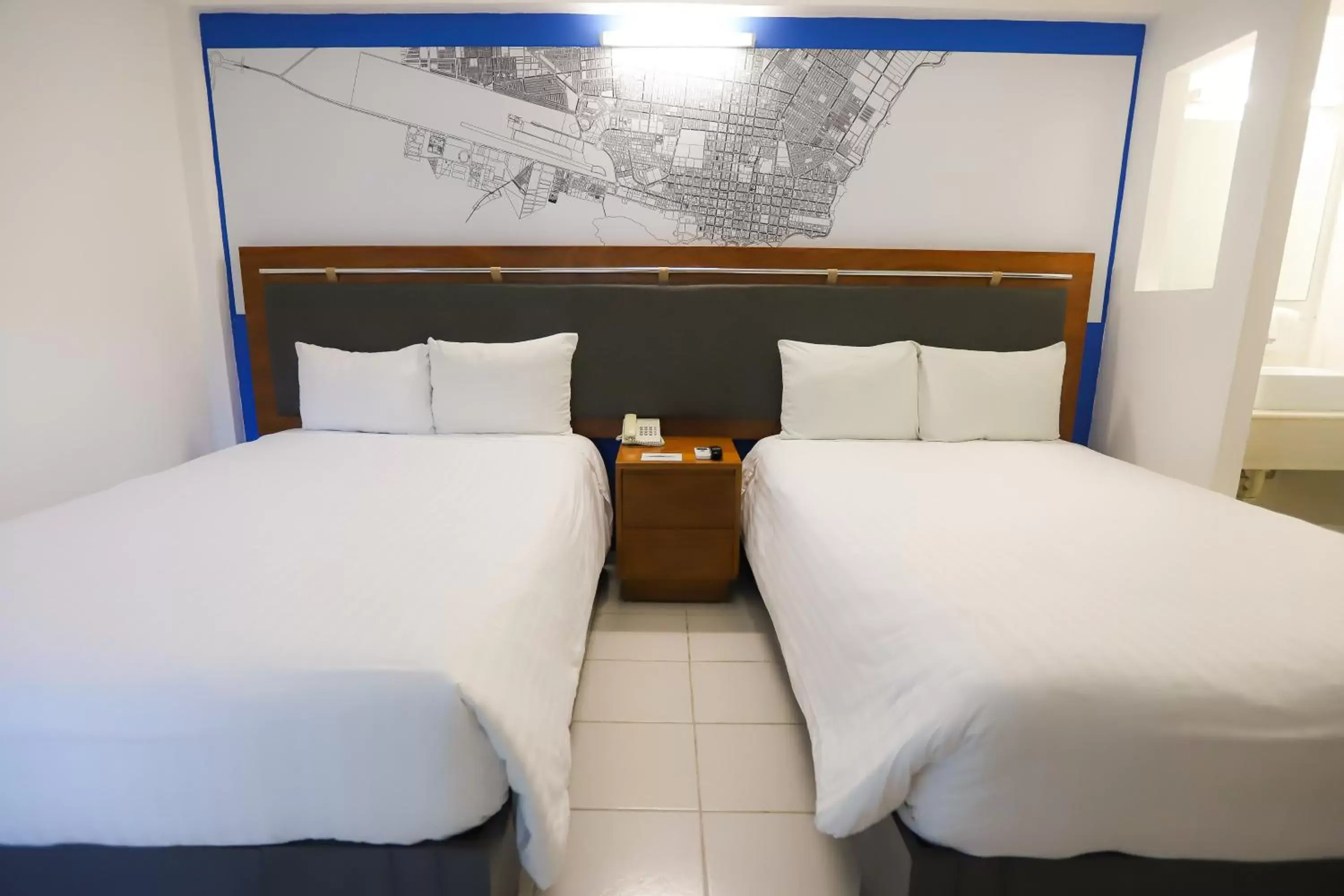 Bed in TRYP by Wyndham Chetumal