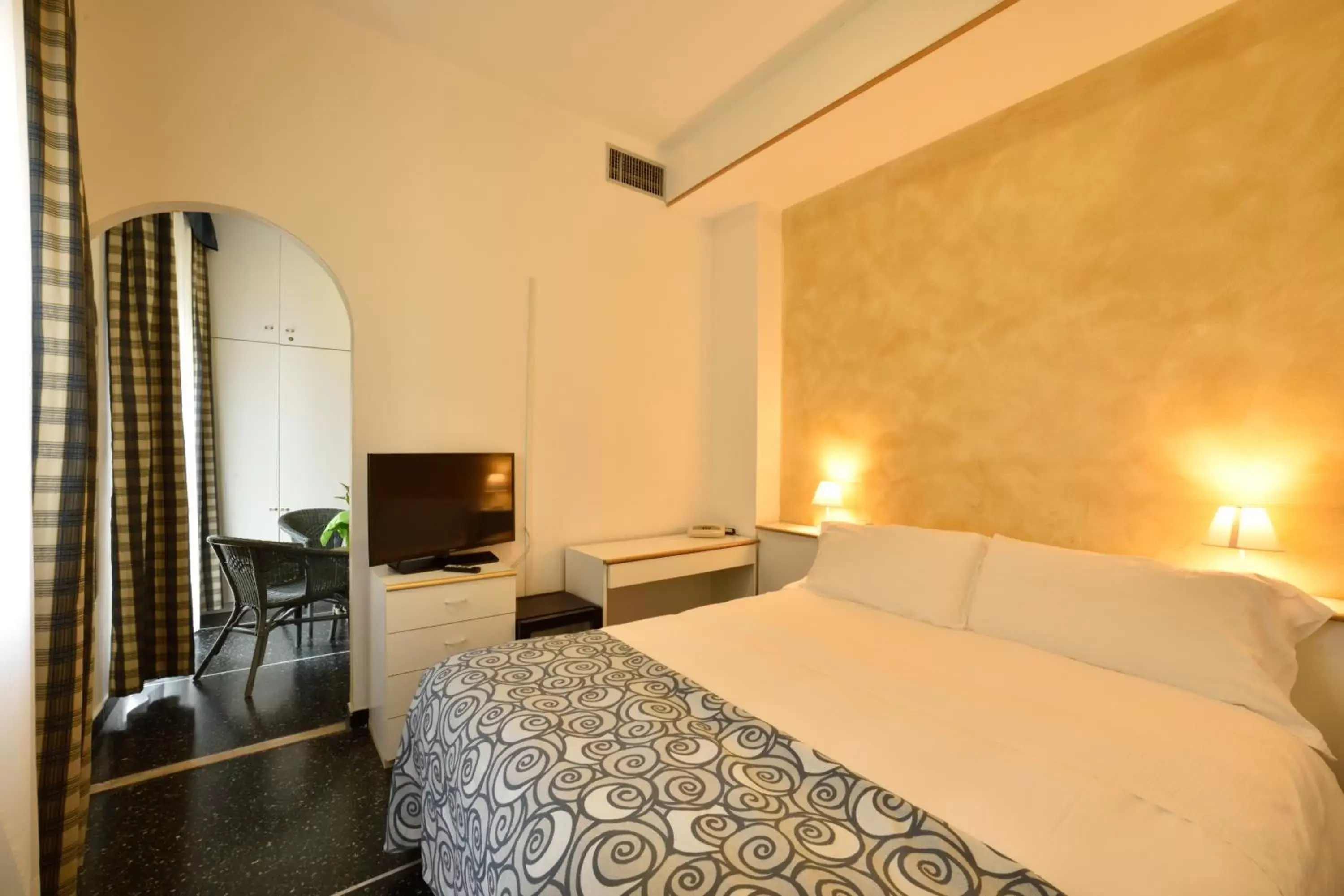 Photo of the whole room, Bed in Hotel Morchio Mhotelsgroup