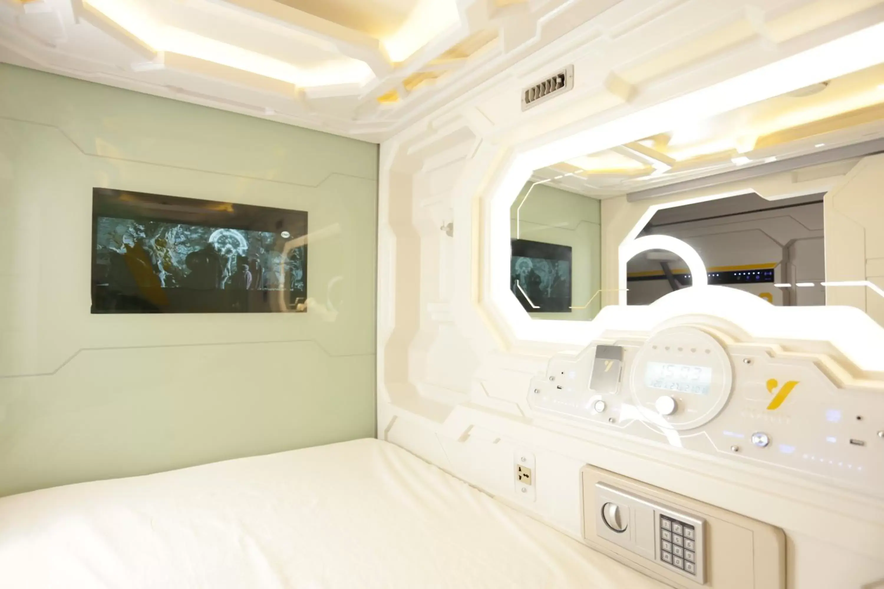 Bed in The Yellow Capsule Experience