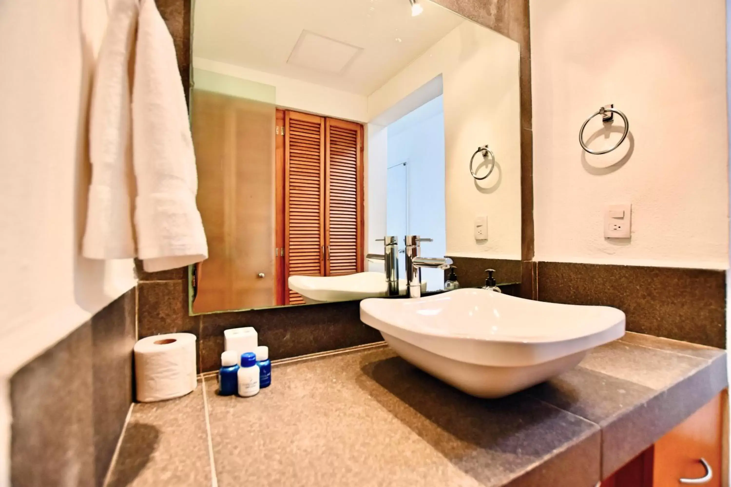 Bathroom in Solymar Condo Beach Resort by Casago