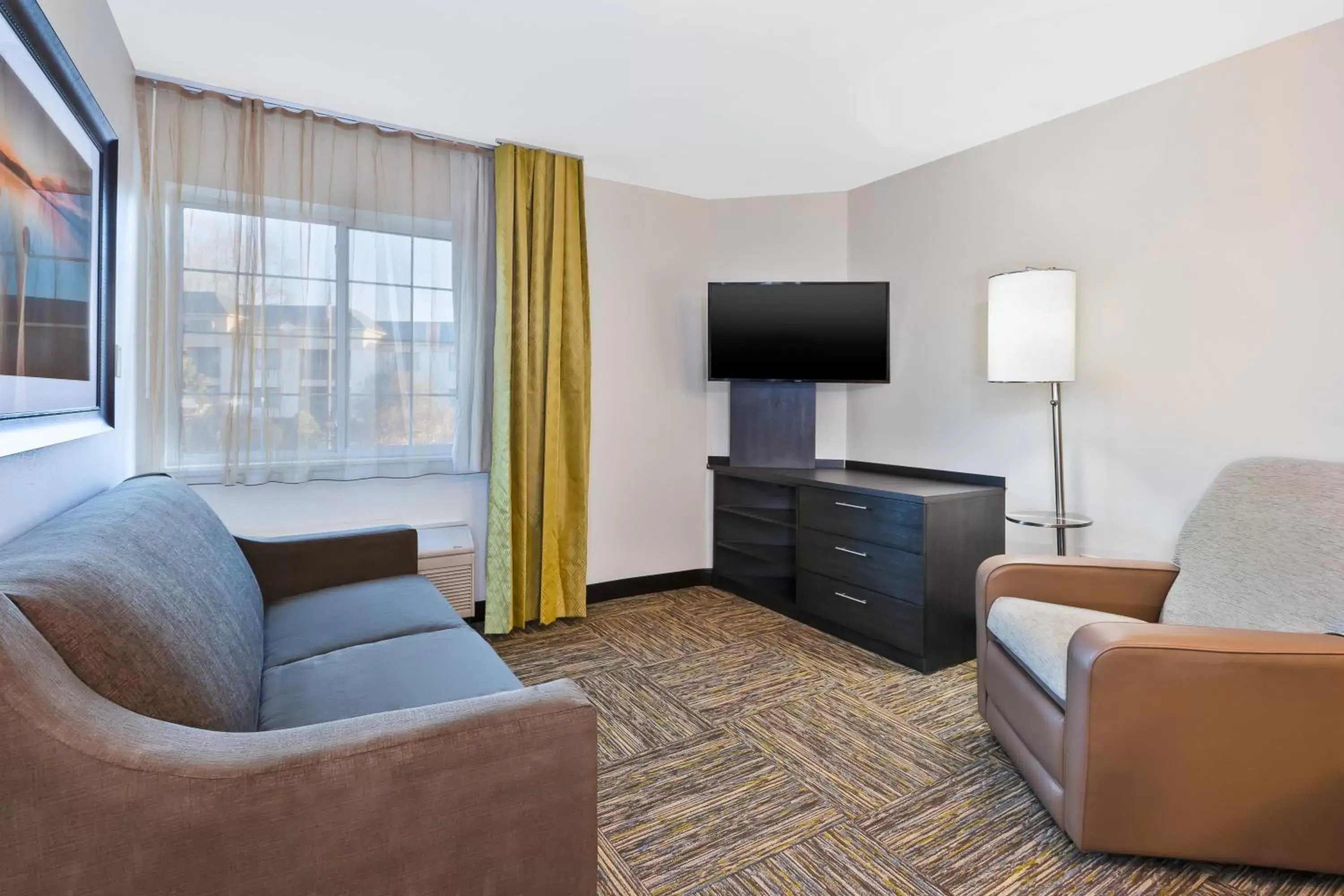 Photo of the whole room, Seating Area in Candlewood Suites Huntersville-Lake Norman Area, an IHG Hotel