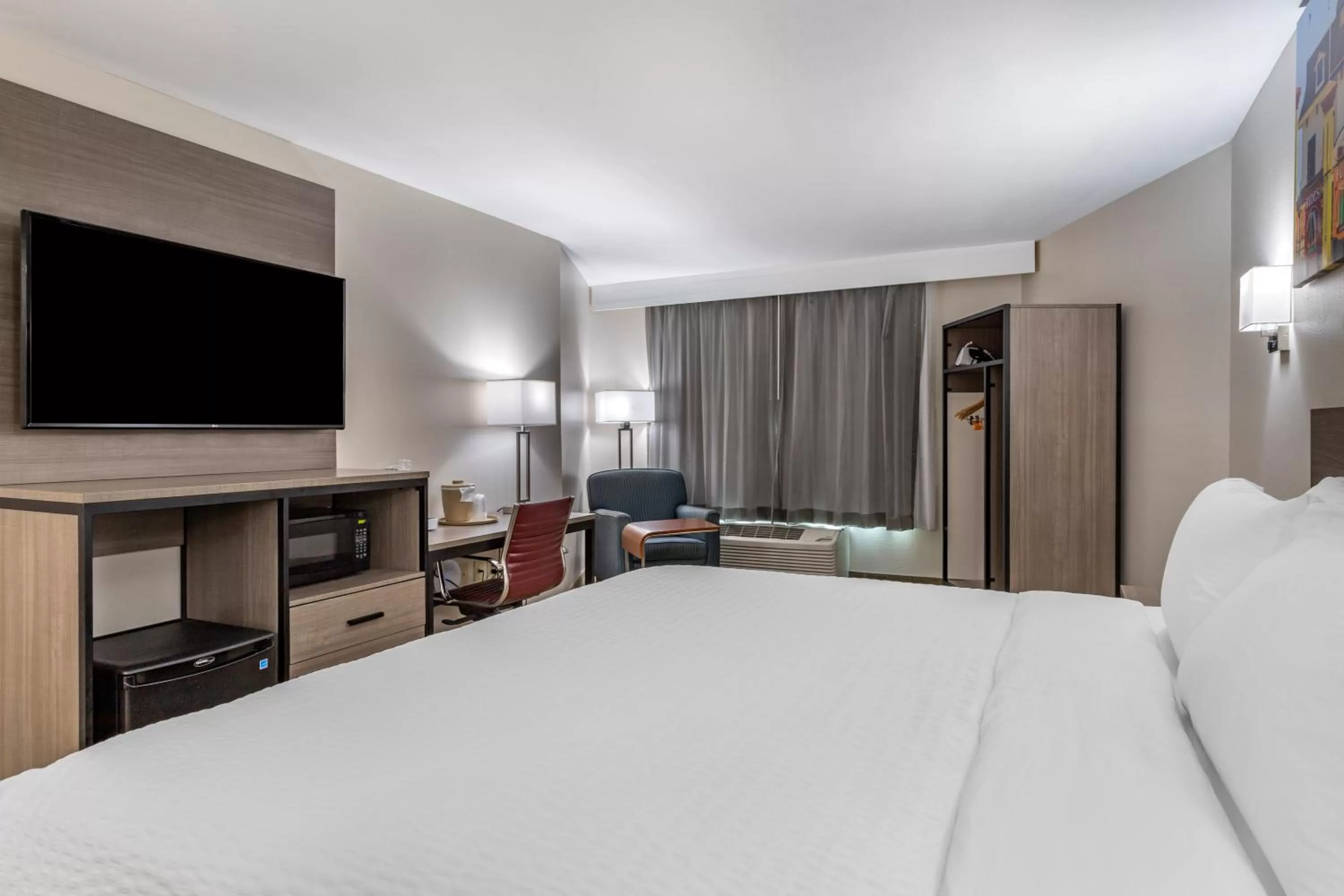 Bedroom, TV/Entertainment Center in Clarion Pointe Galveston Seawall