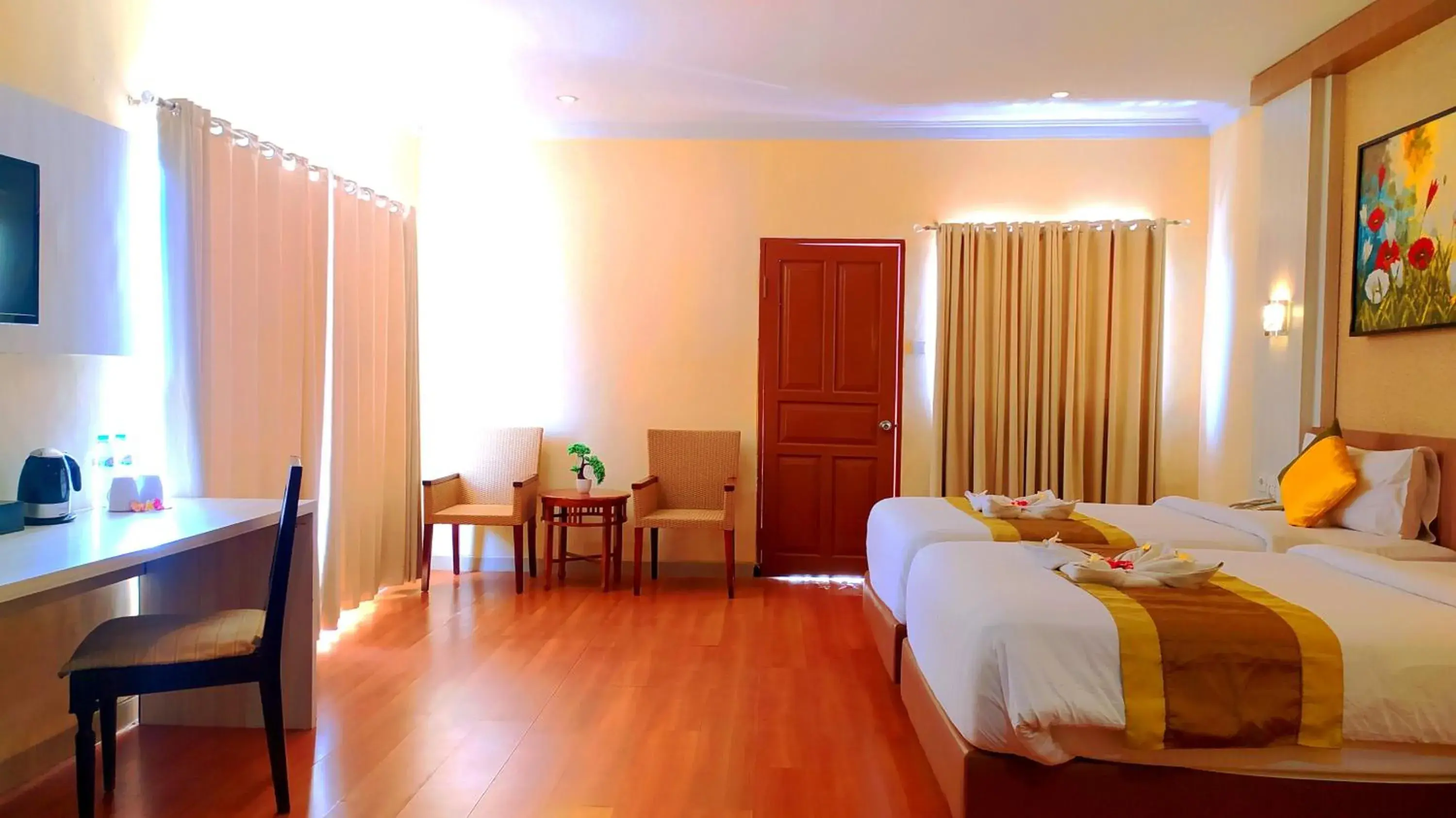 Bedroom in Puri Saron Denpasar Hotel