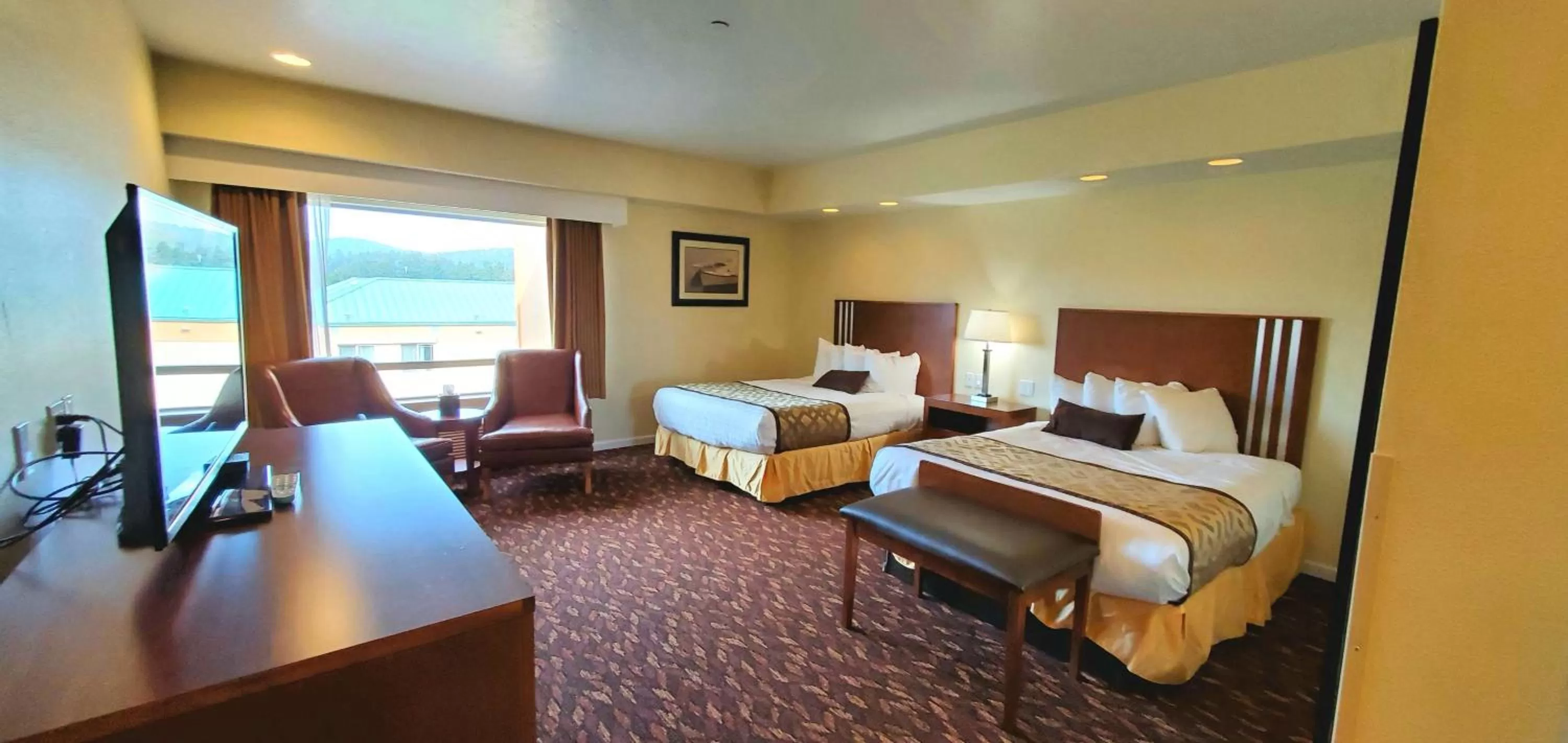 Queen Suite with Four Queen Beds in Best Western Plus Northwoods Inn