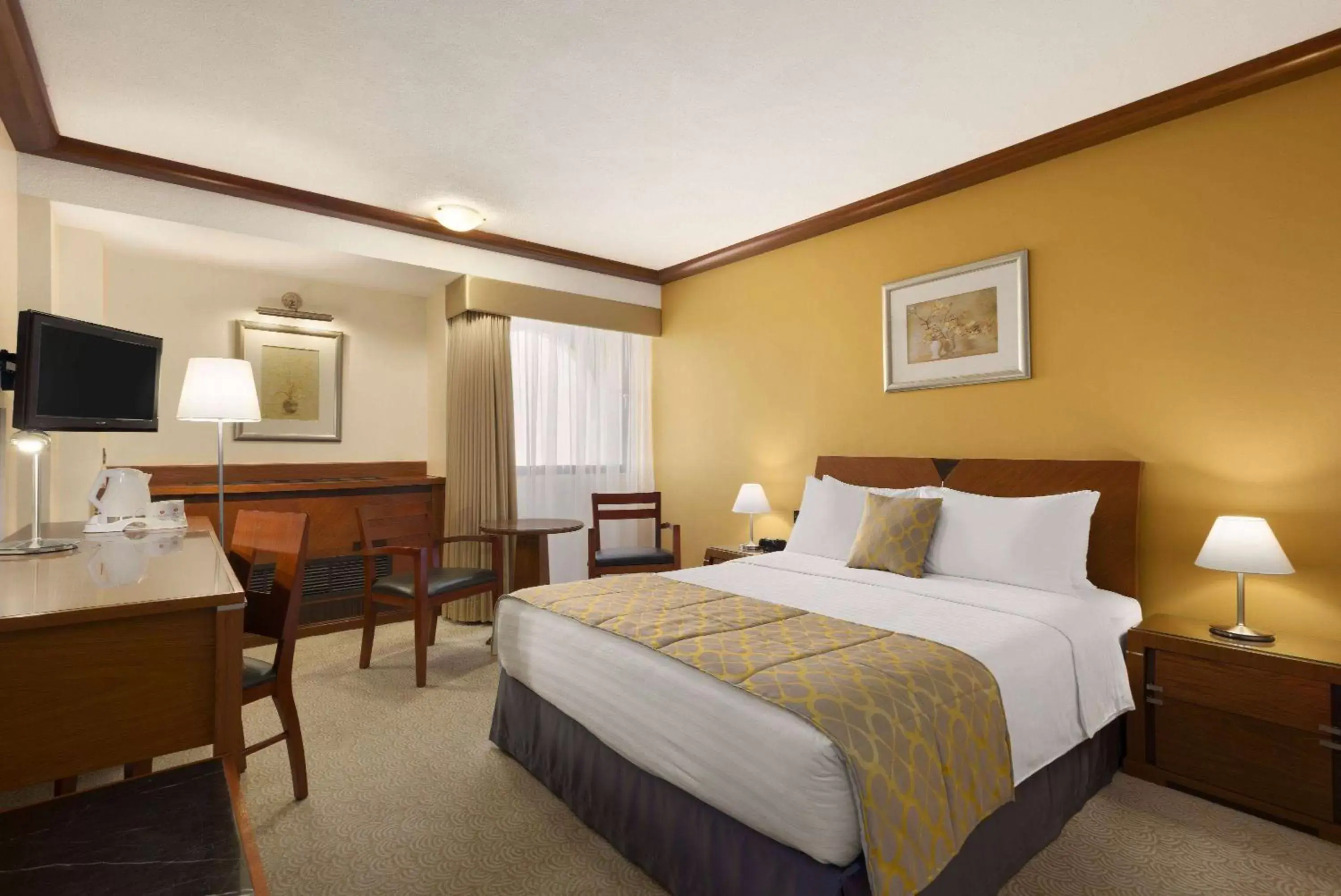 Photo of the whole room, Bed in Ramada by Wyndham Bahrain Photo of the whole room, Bed in Ramada by Wyndham Bahrain