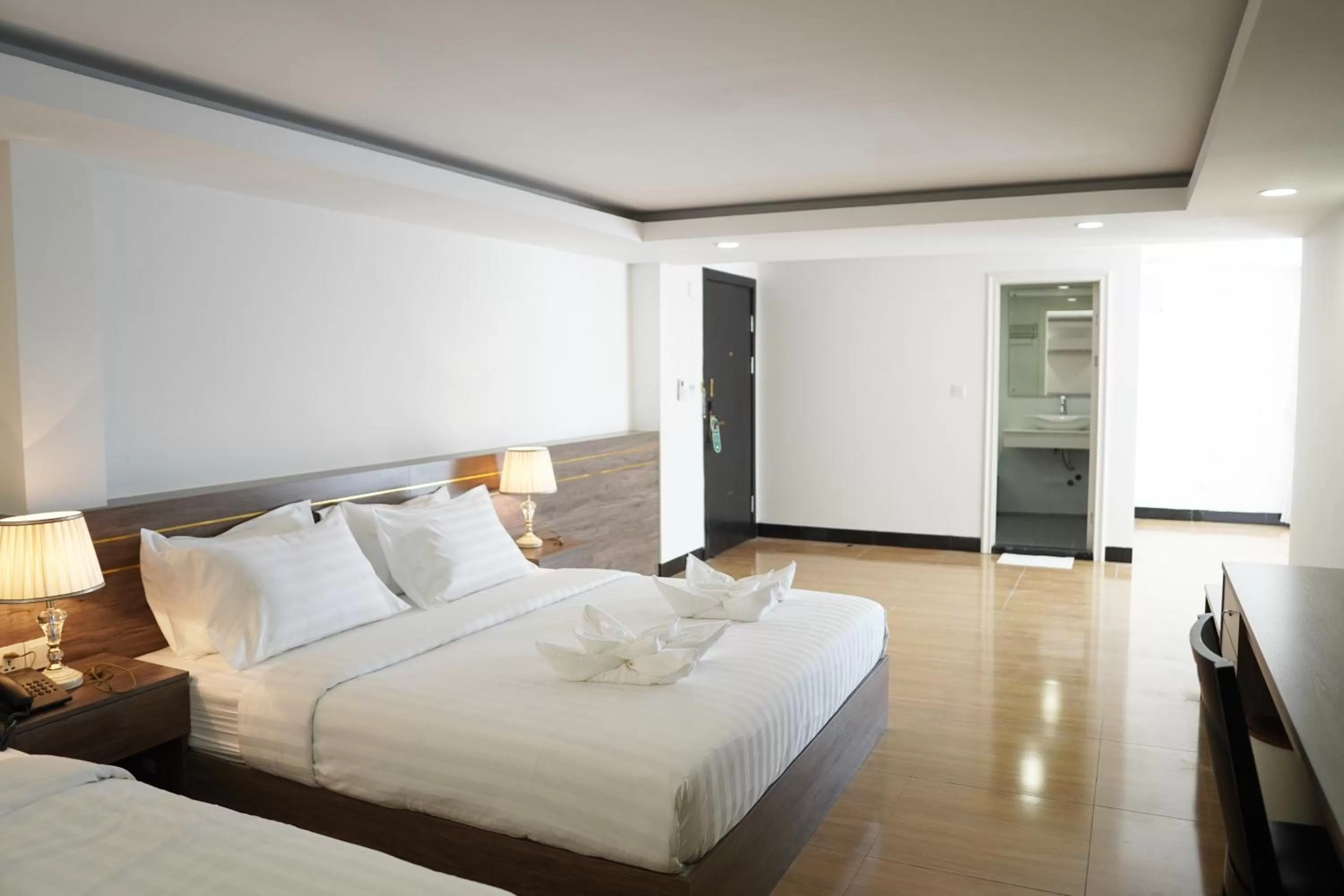 Photo of the whole room, Bed in Apple Hotel Three - Phnom Penh