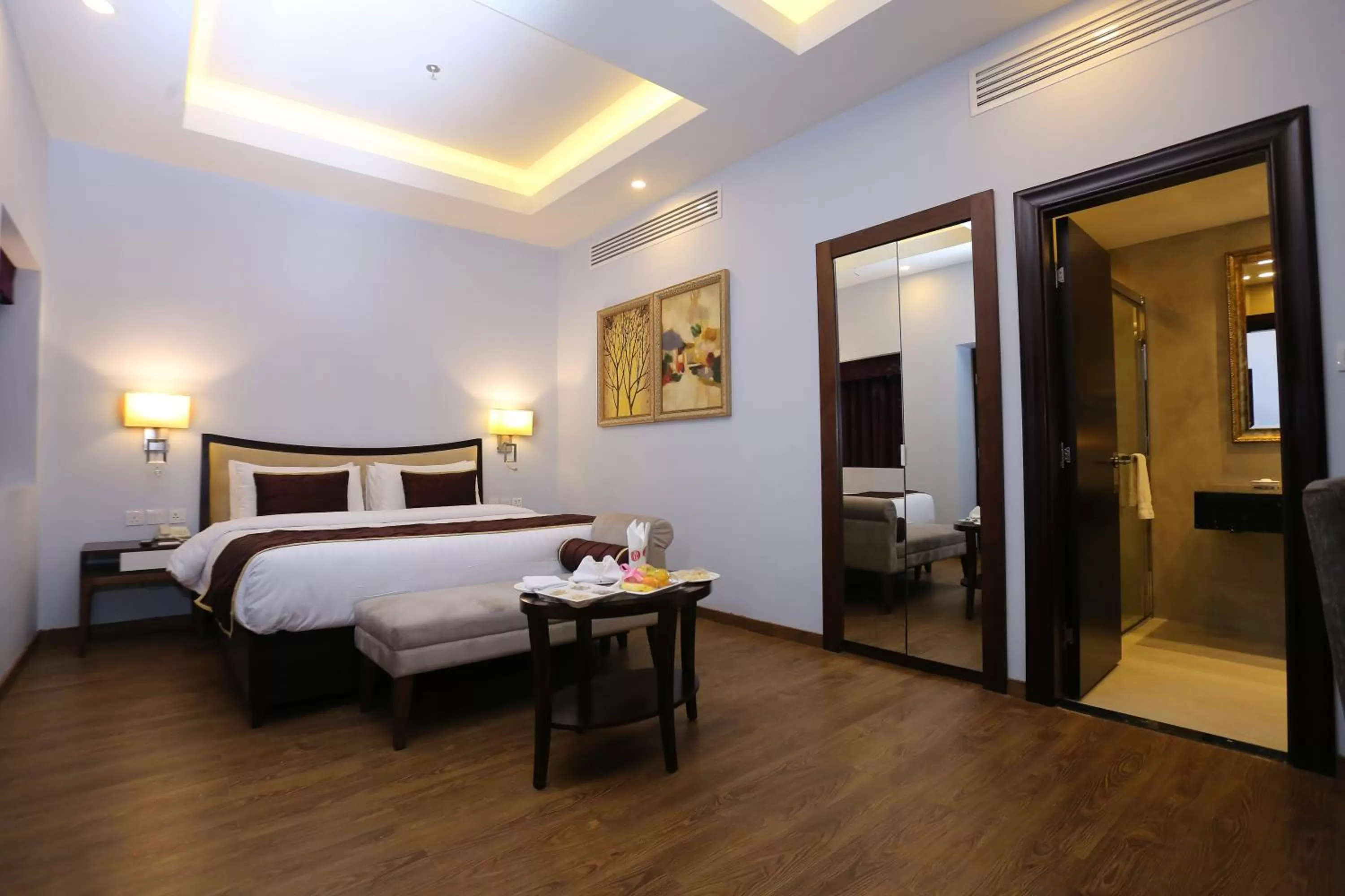 Bed in Ramada Plaza by Wyndham Karachi Airport Hotel