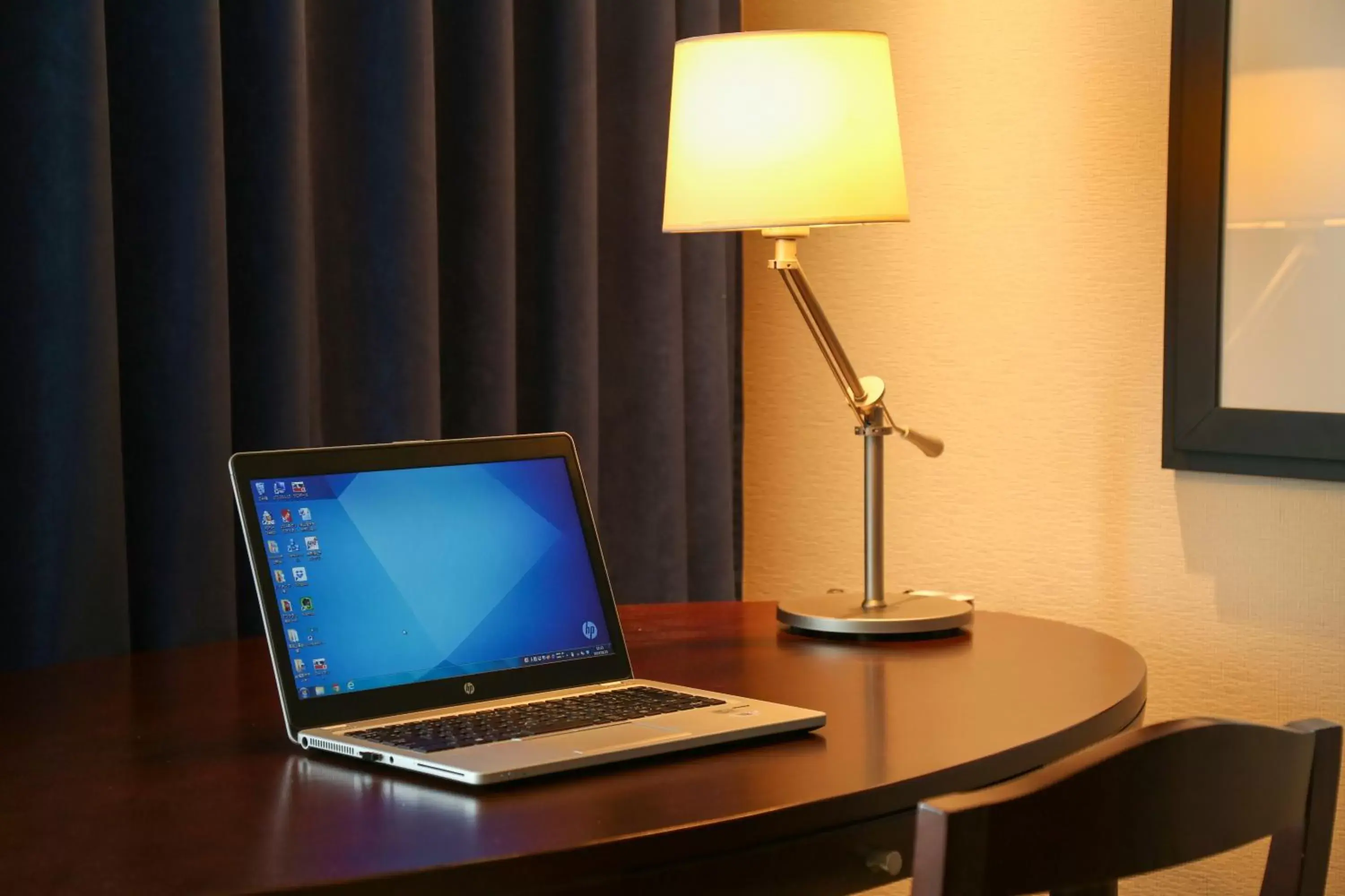 Living room, TV/Entertainment Center in ANA Crowne Plaza Okayama, an IHG Hotel