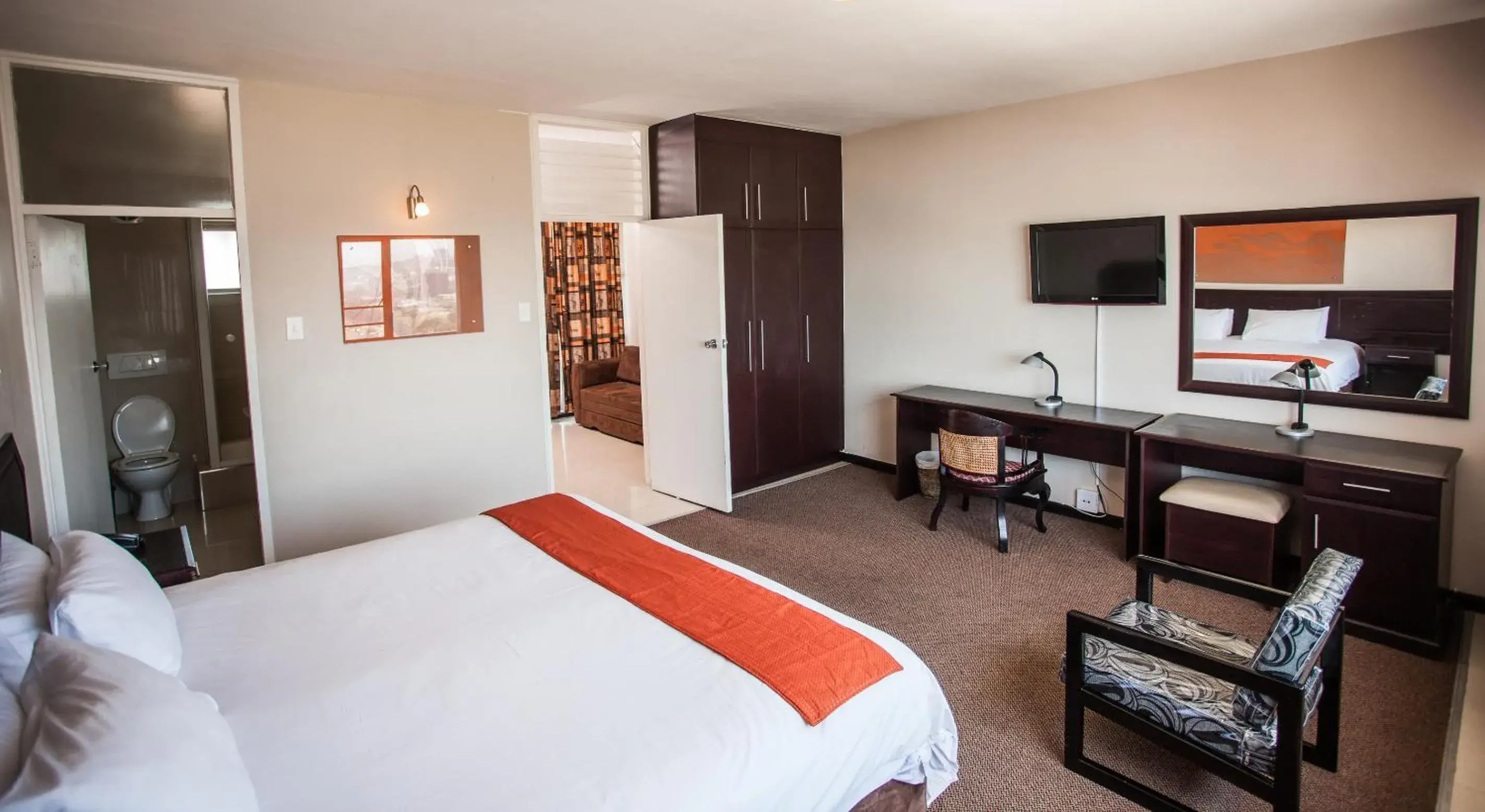 Bed, TV/Entertainment Center in Coastlands Durban Self Catering Holiday Apartments
