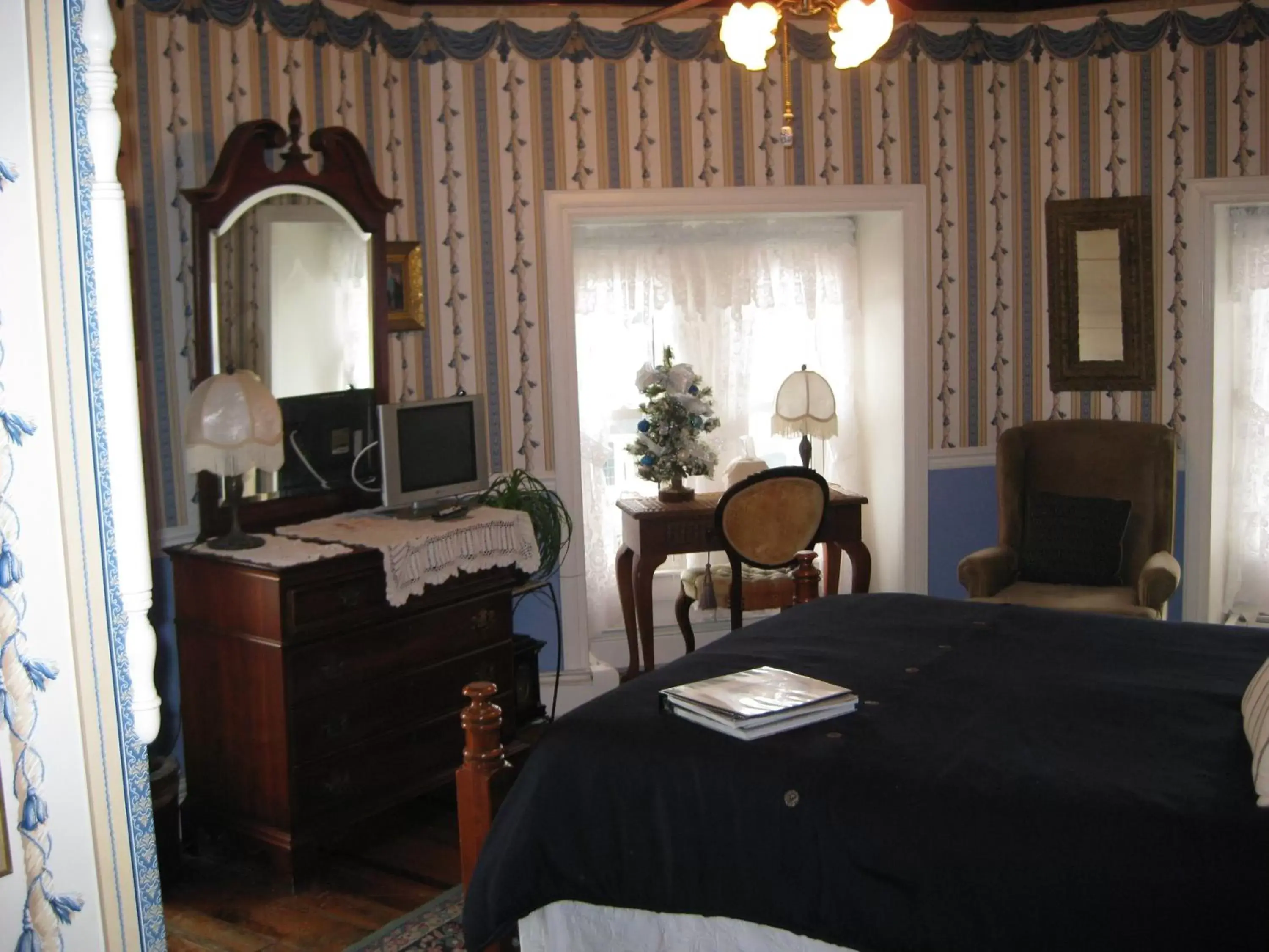 Bedroom, TV/Entertainment Center in Angel of the Sea Bed and Breakfast