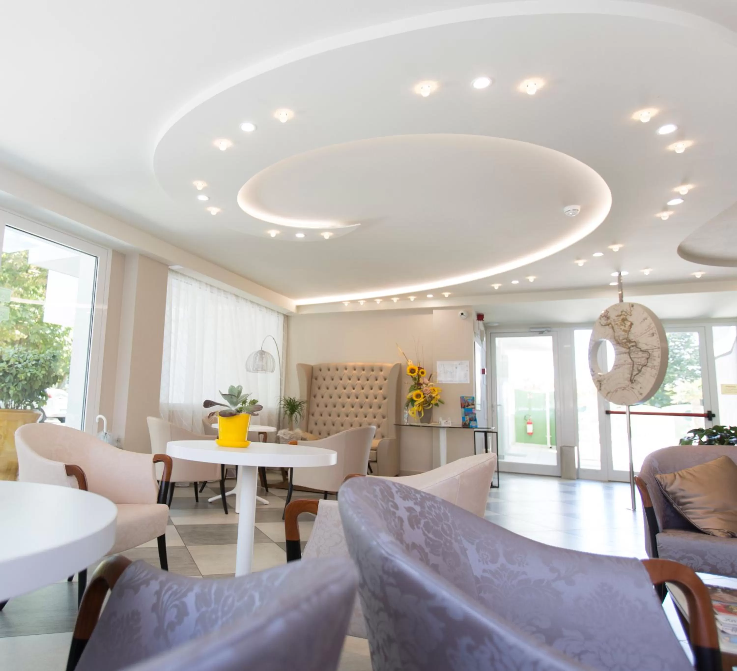 Communal lounge/ TV room in Nero D'Avorio Aparthotel & SPA