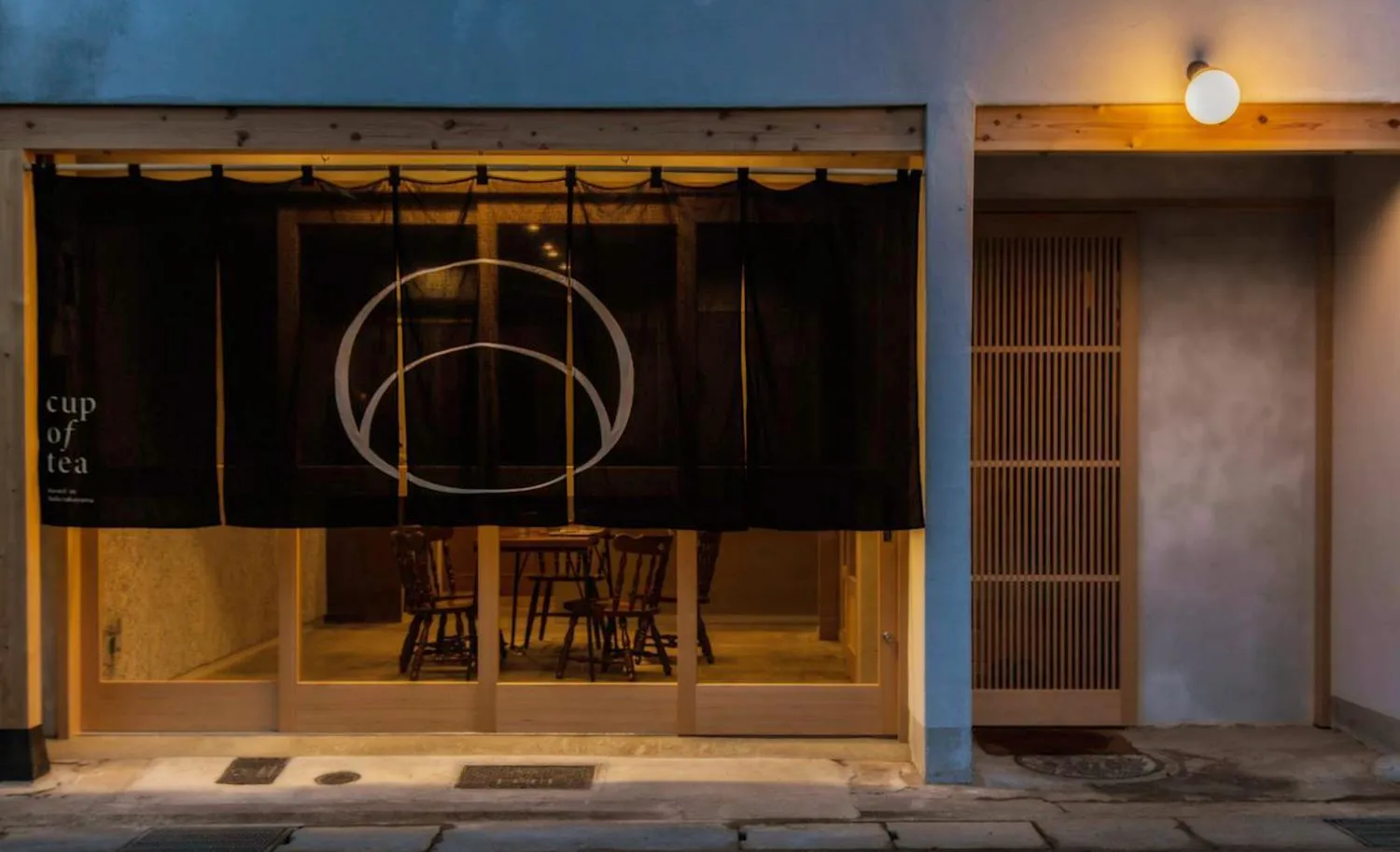 Property building in cup of tea