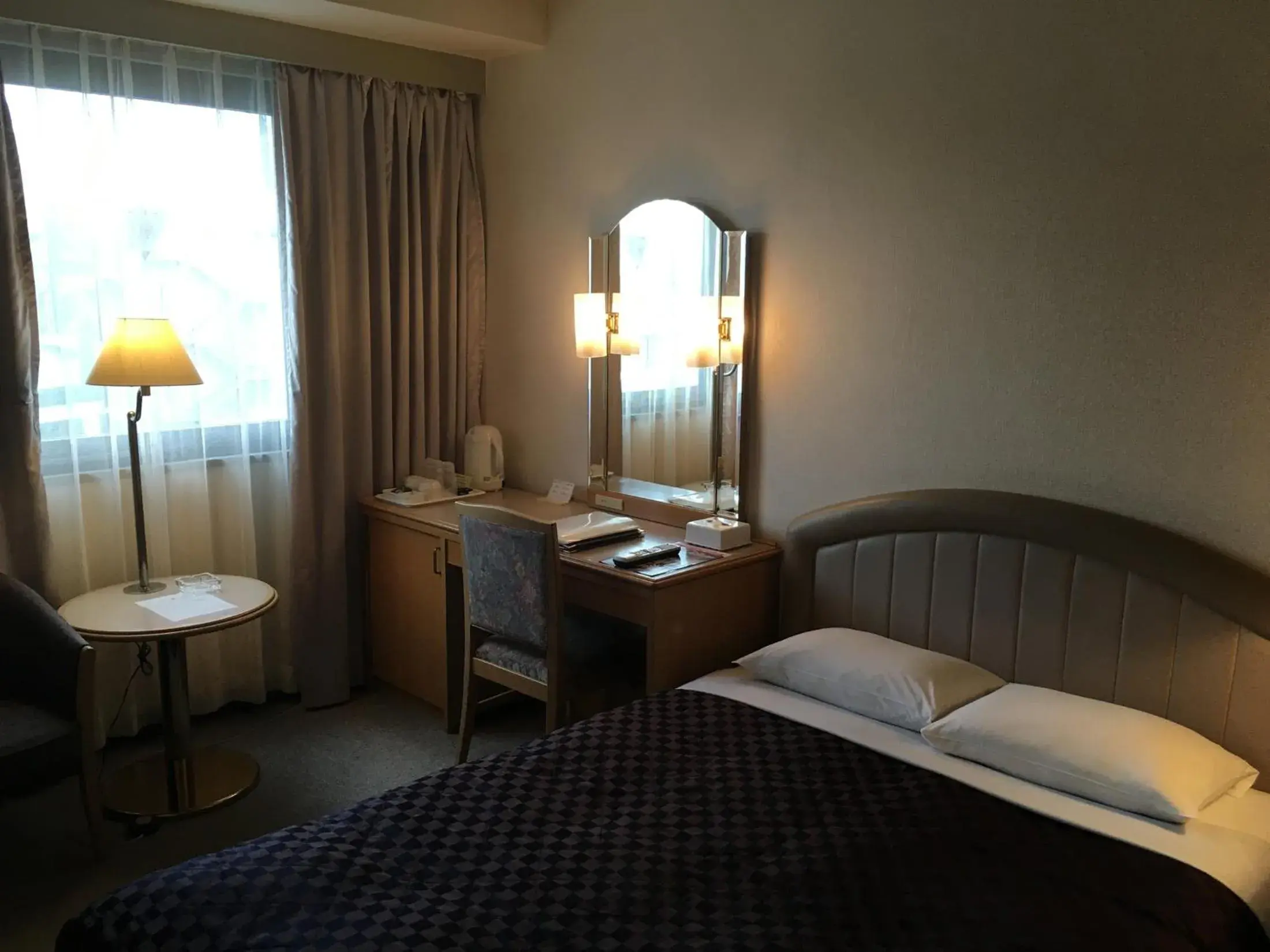 Bed in Urayasu Beaufort Hotel