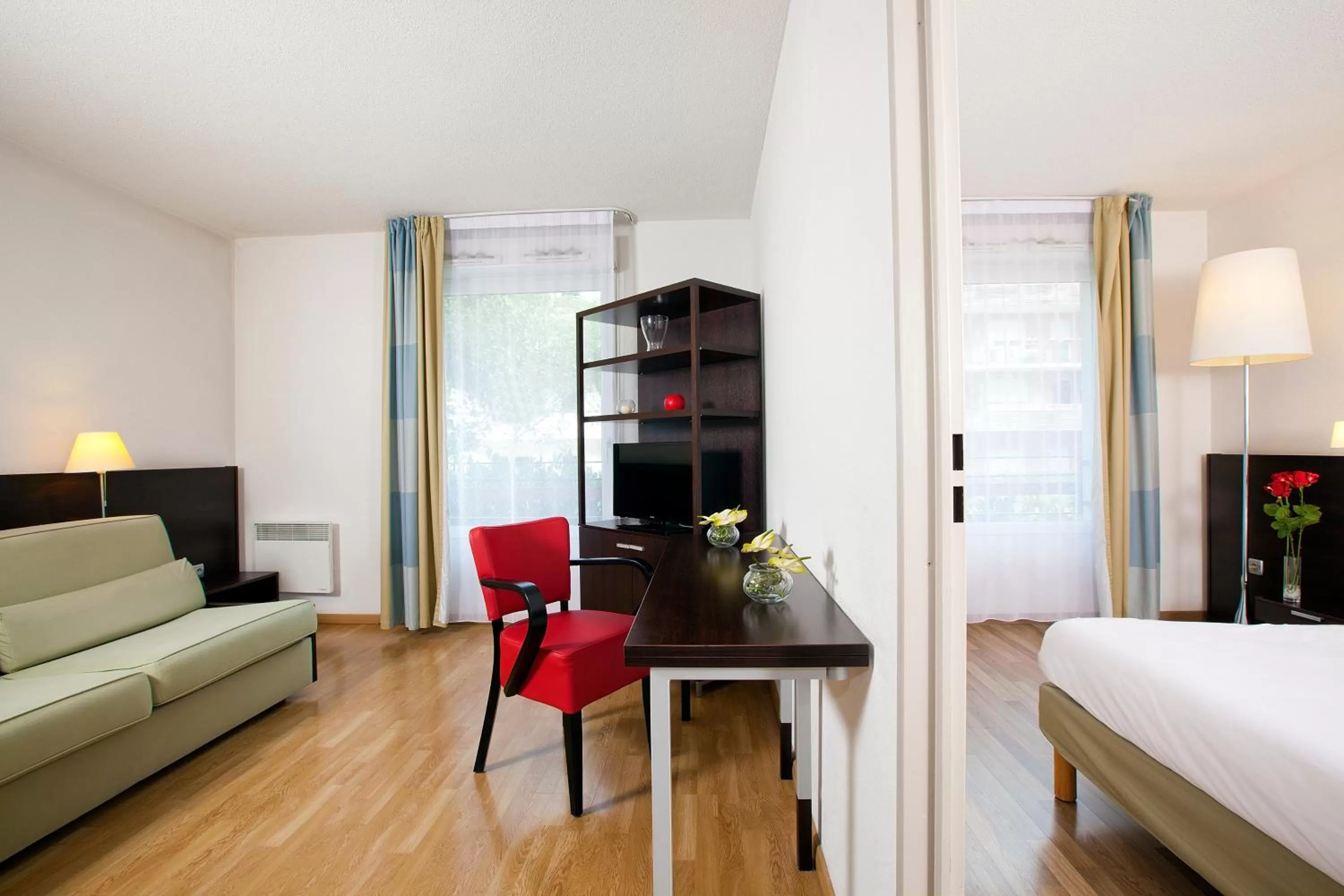 Seating area, Bed in Residhome Nancy Lorraine