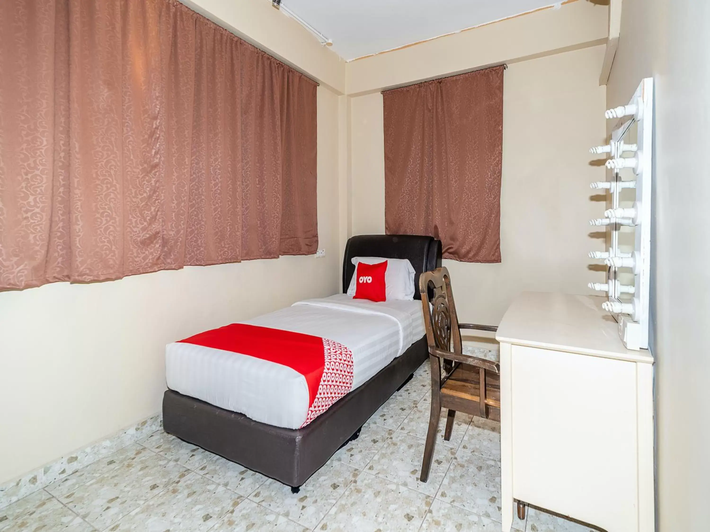 Bed in OYO 89932 Dd Homestay