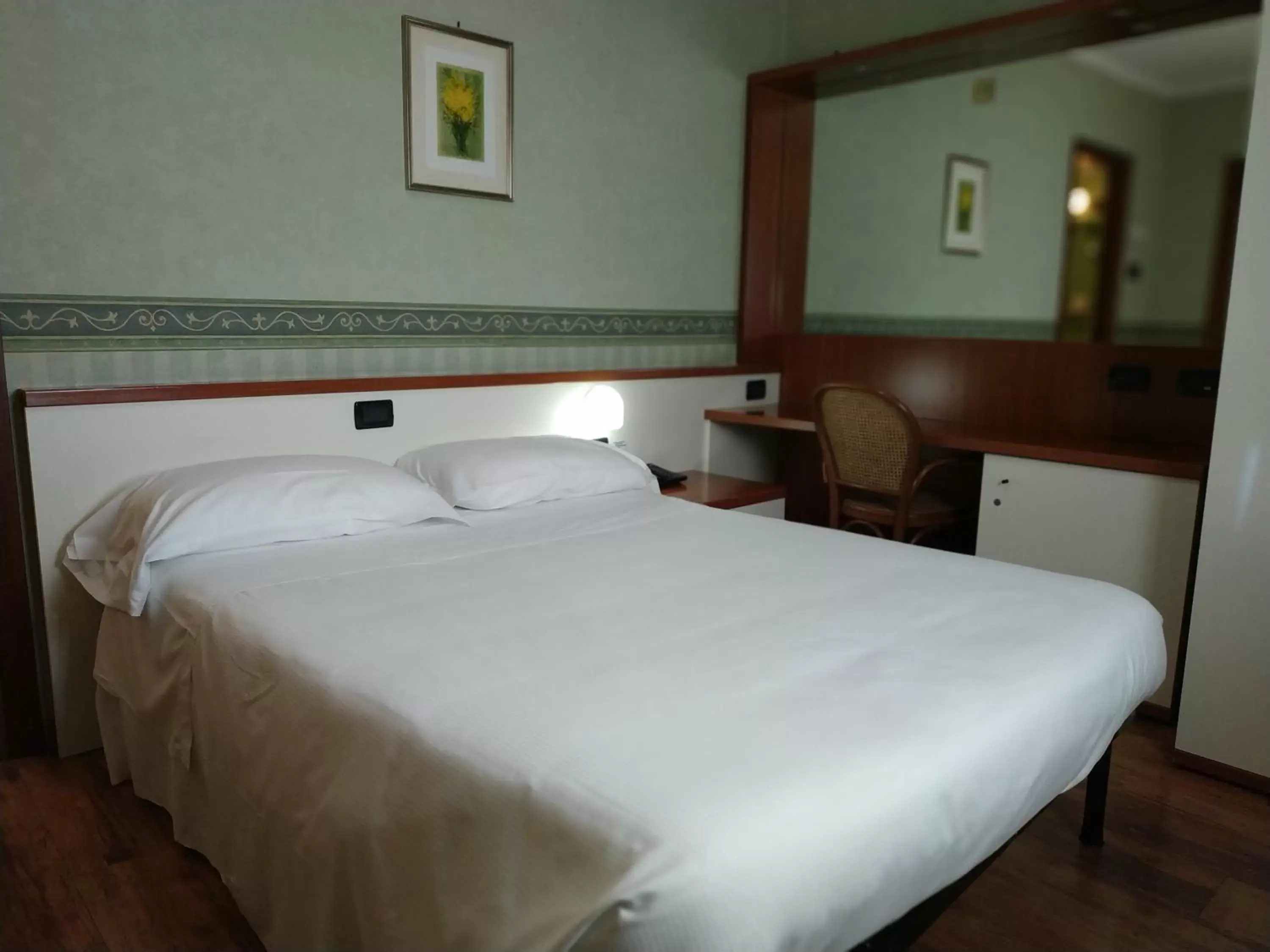 Bed in Hotel Aurora Bed in Hotel Aurora