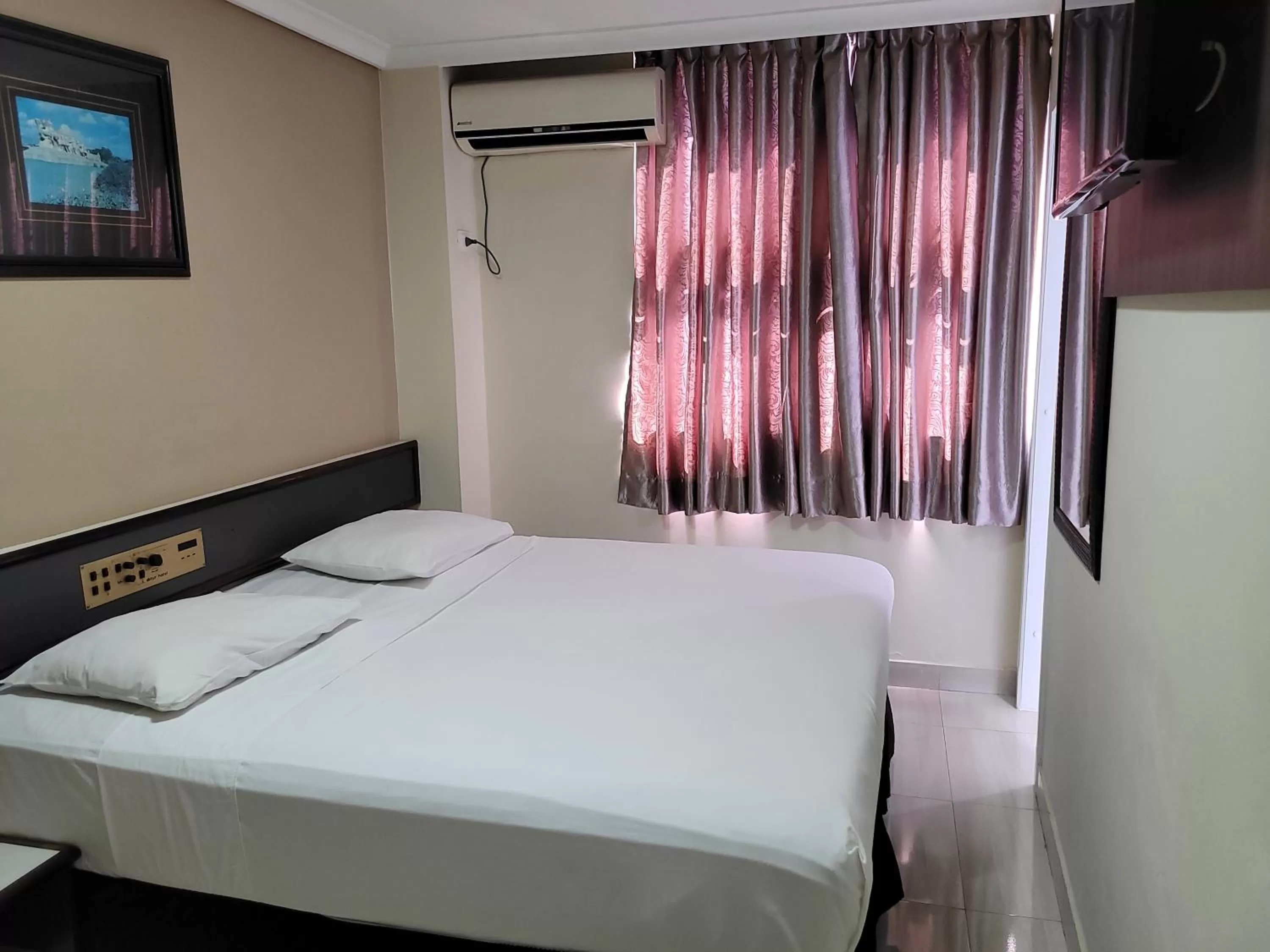 Bed in Hotel Estação Express