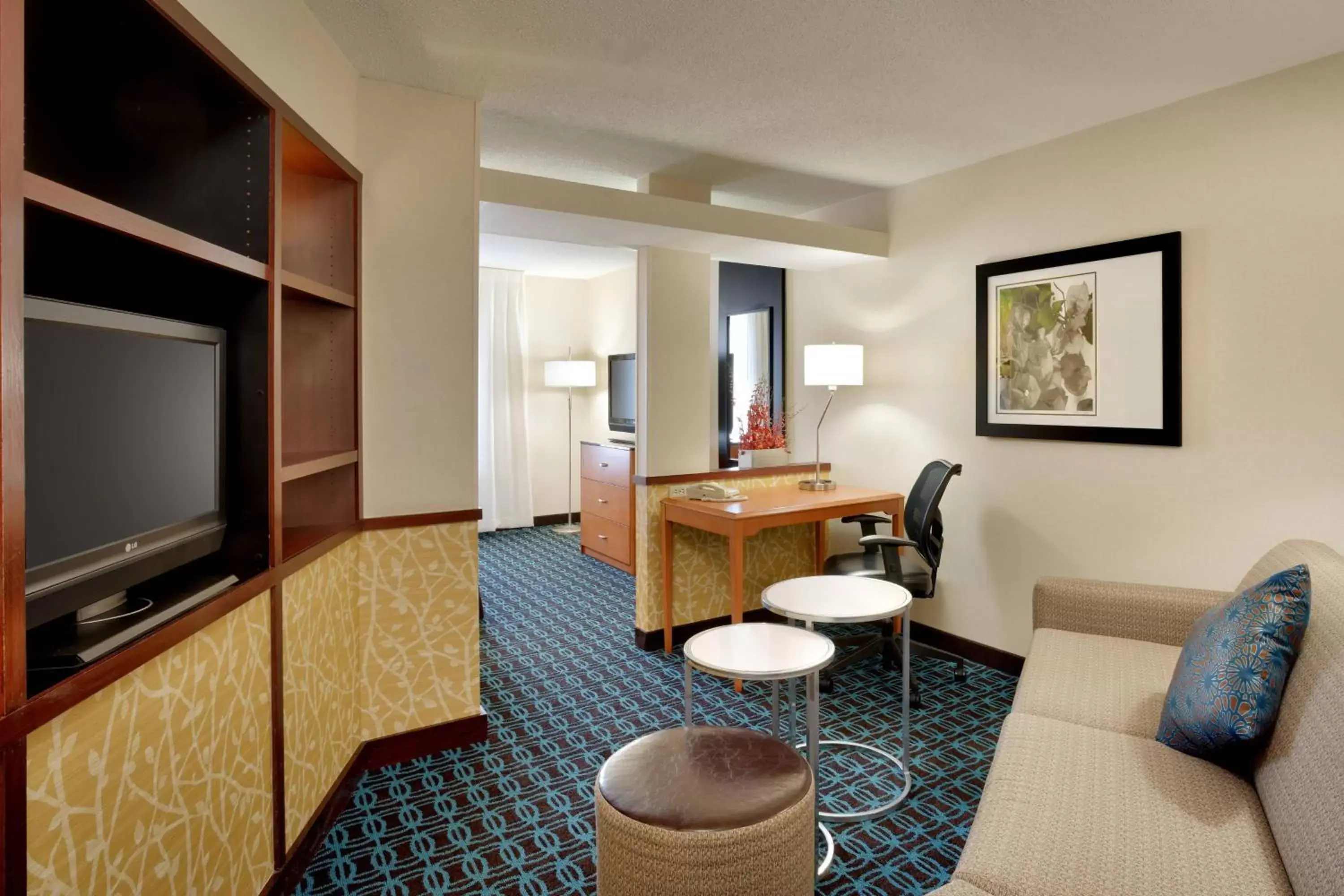 Photo of the whole room, TV/Entertainment Center in Fairfield Inn & Suites Salt Lake City Airport