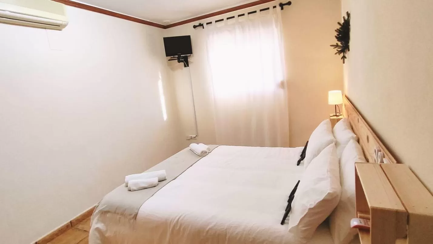 Bed in El Bosque Suites&Room