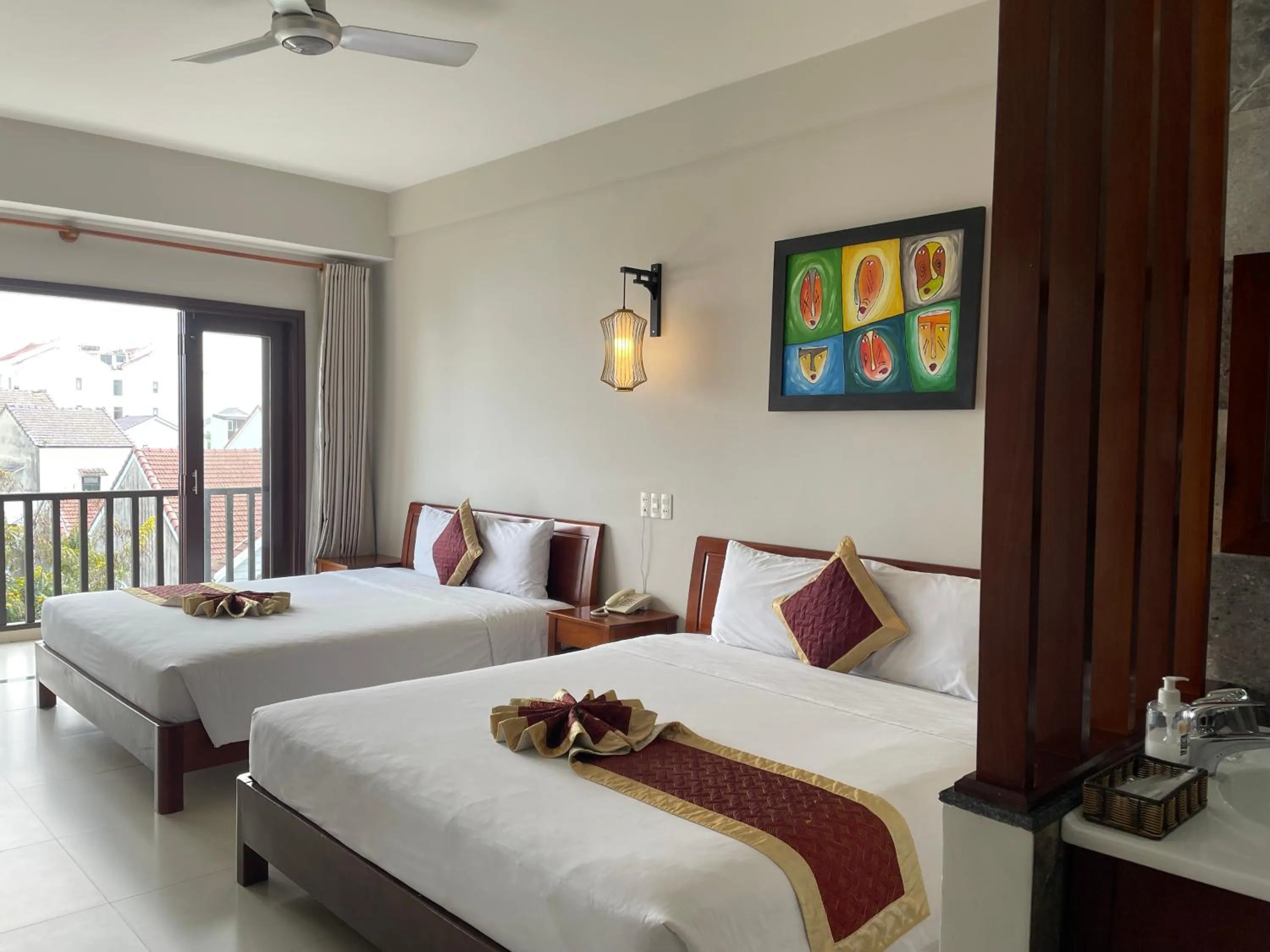 Bed in Sunshine Hoian Hotel