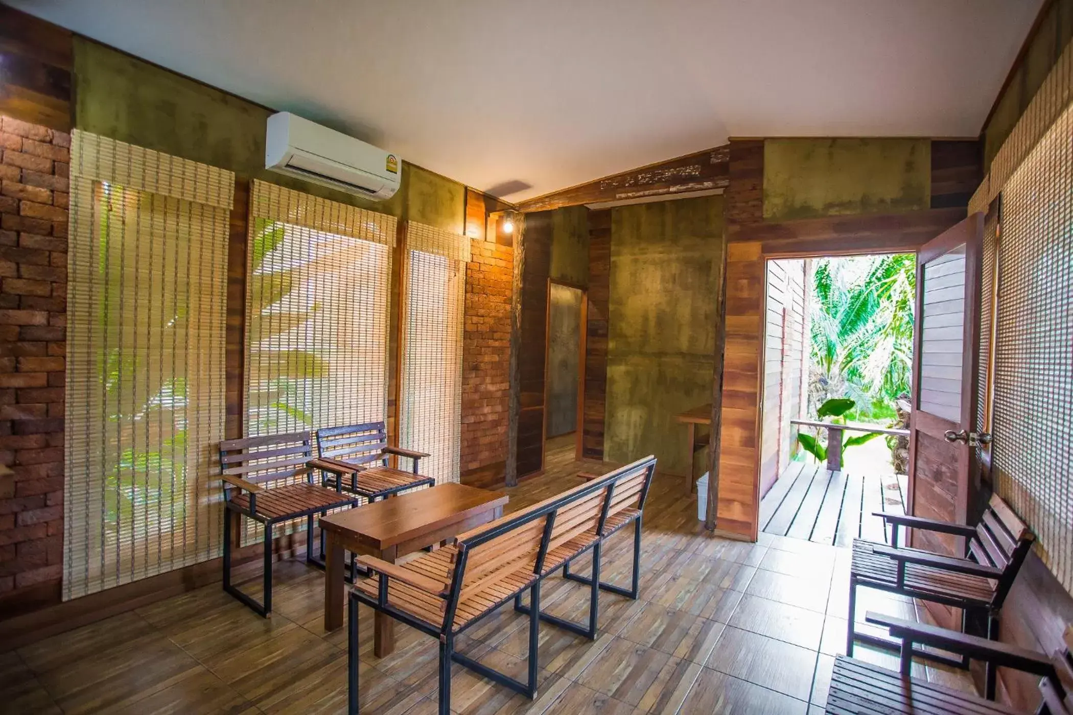 Living room in Palm Pran Resort