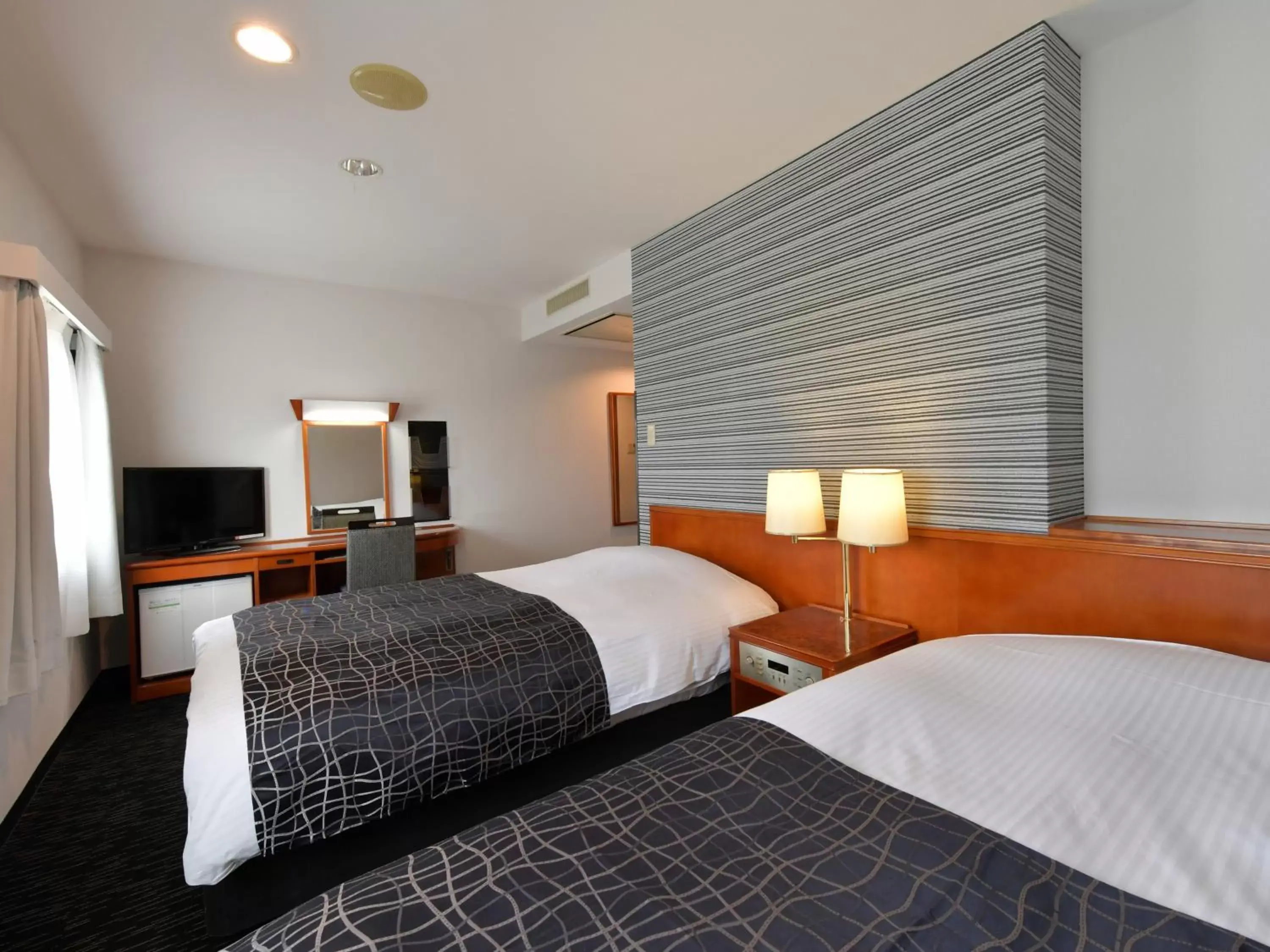 Photo of the whole room, Bed in APA Hotel Ogaki Ekimae