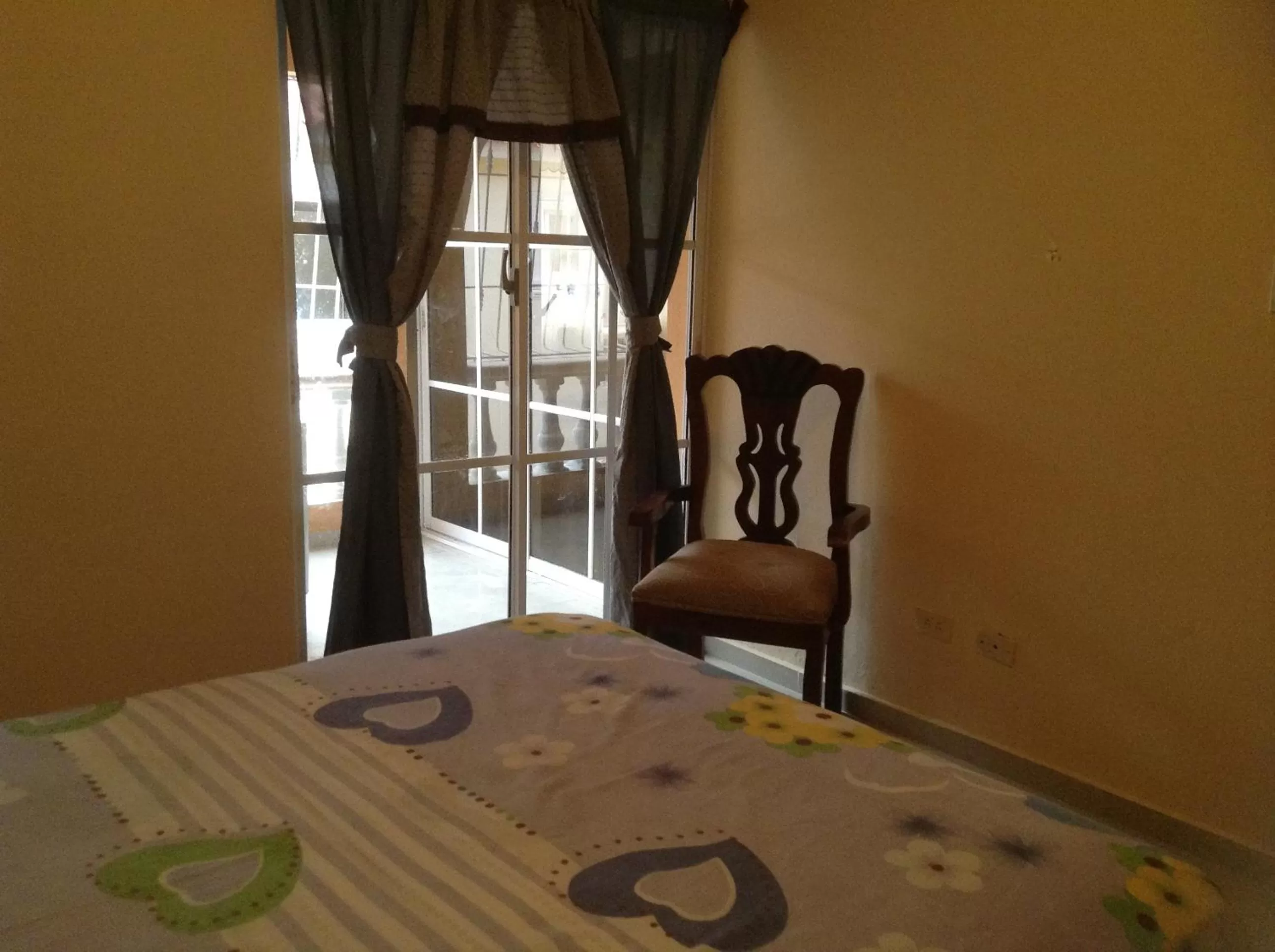 Decorative detail, Bed in White Sands shared apartments