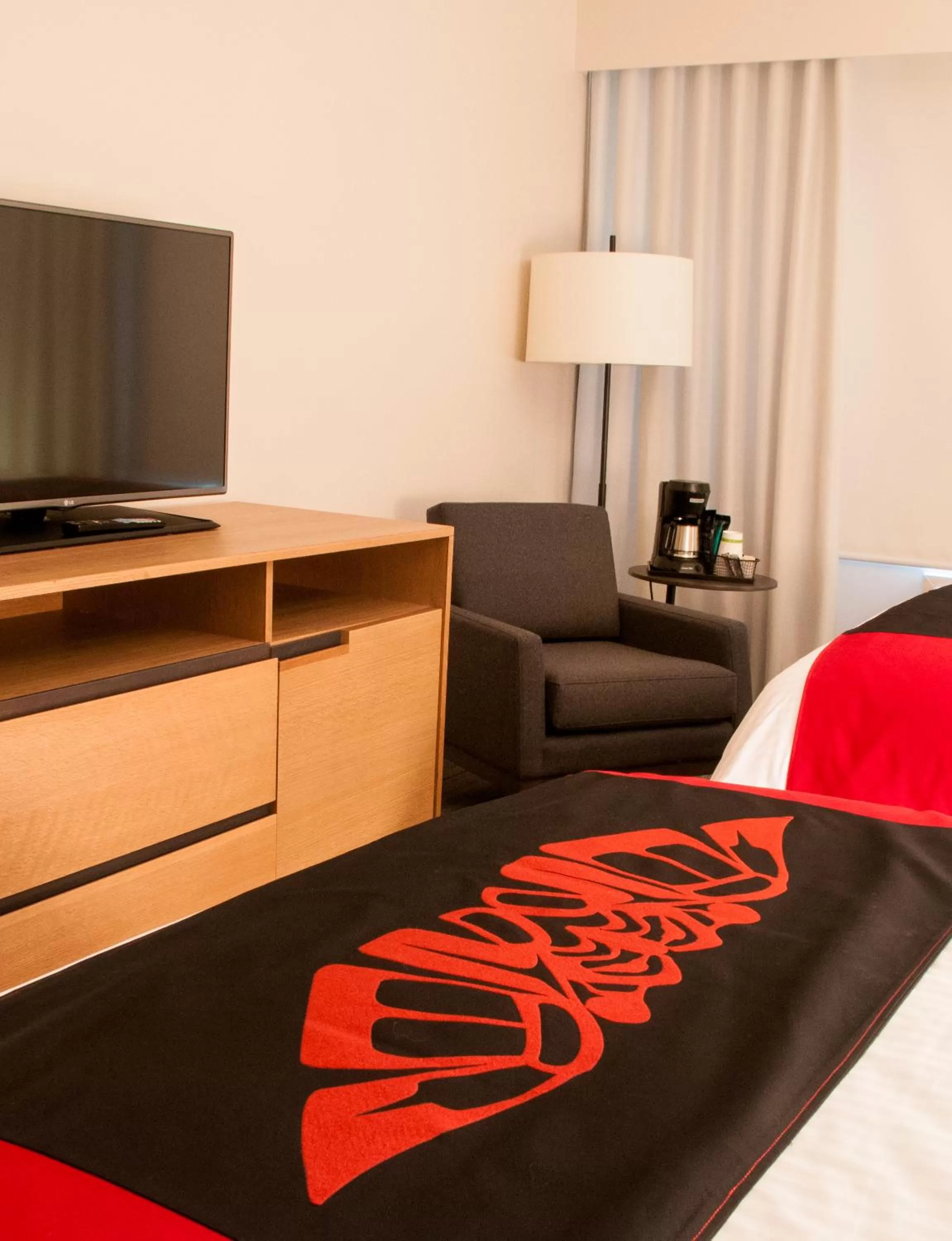 Living room, Bed in Kwa'lilas Hotel