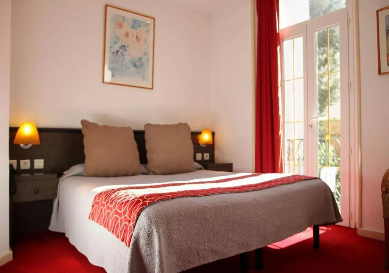 Bed in Hôtel restaurant Oasis Bed in Hôtel restaurant Oasis