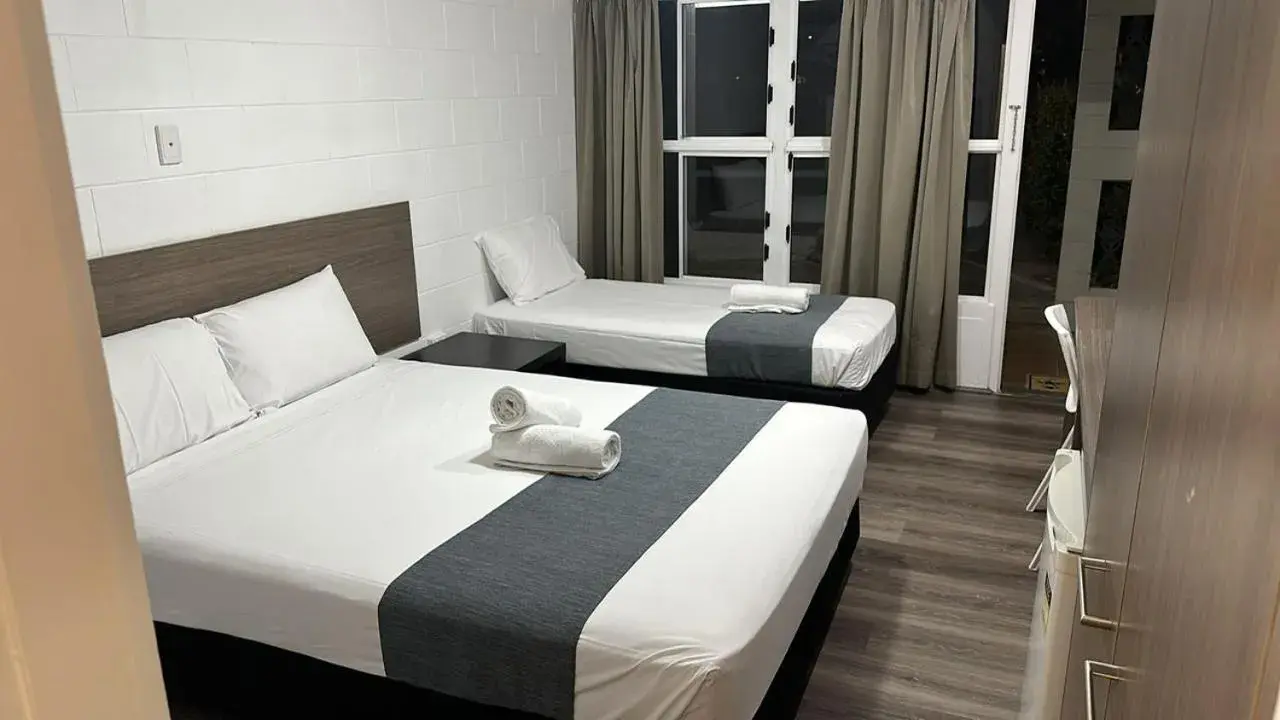 Bed in Townsville City Motel