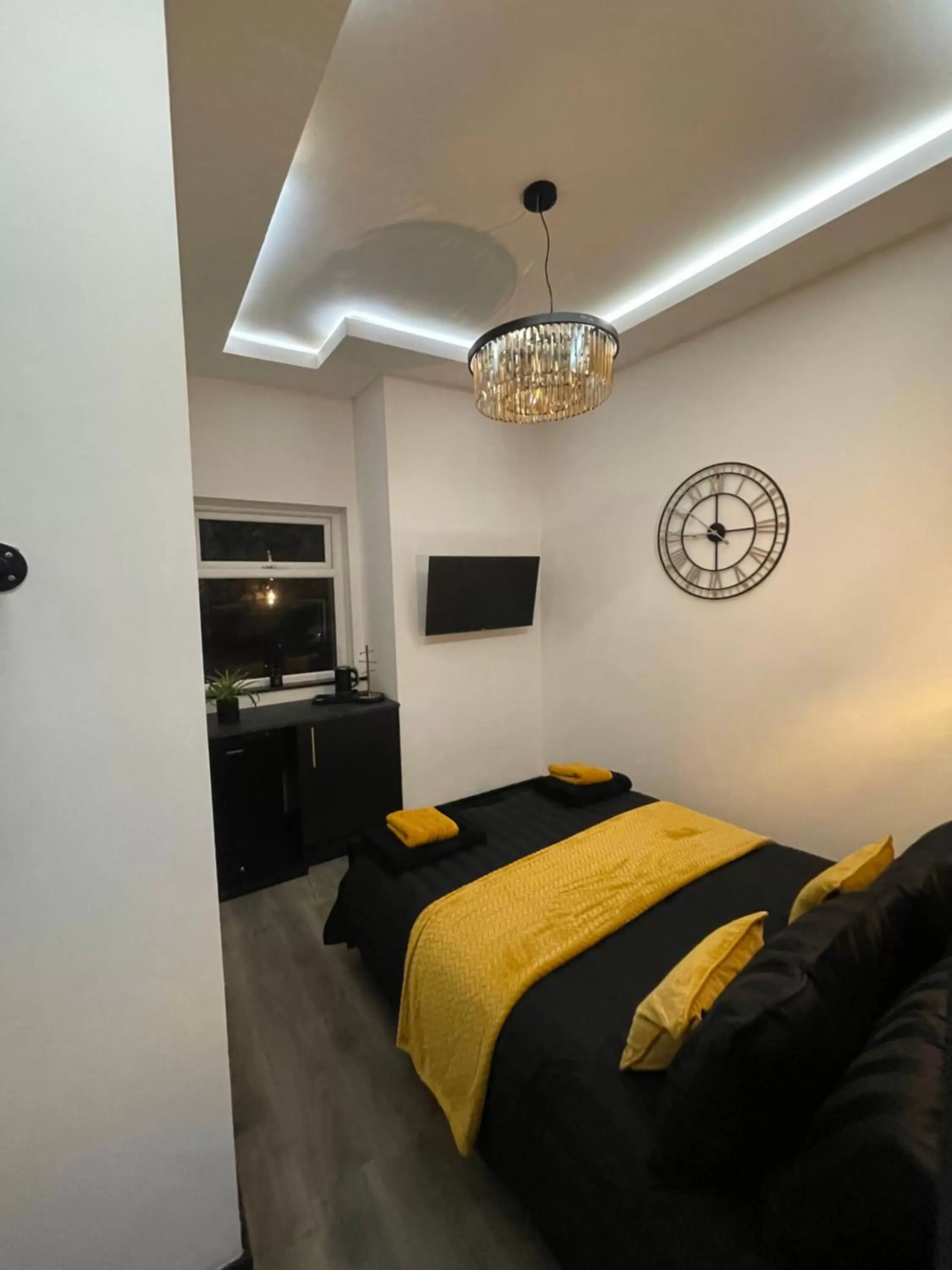 Bed in RESIDENCY LUXURY SEAFRONT HOTEL