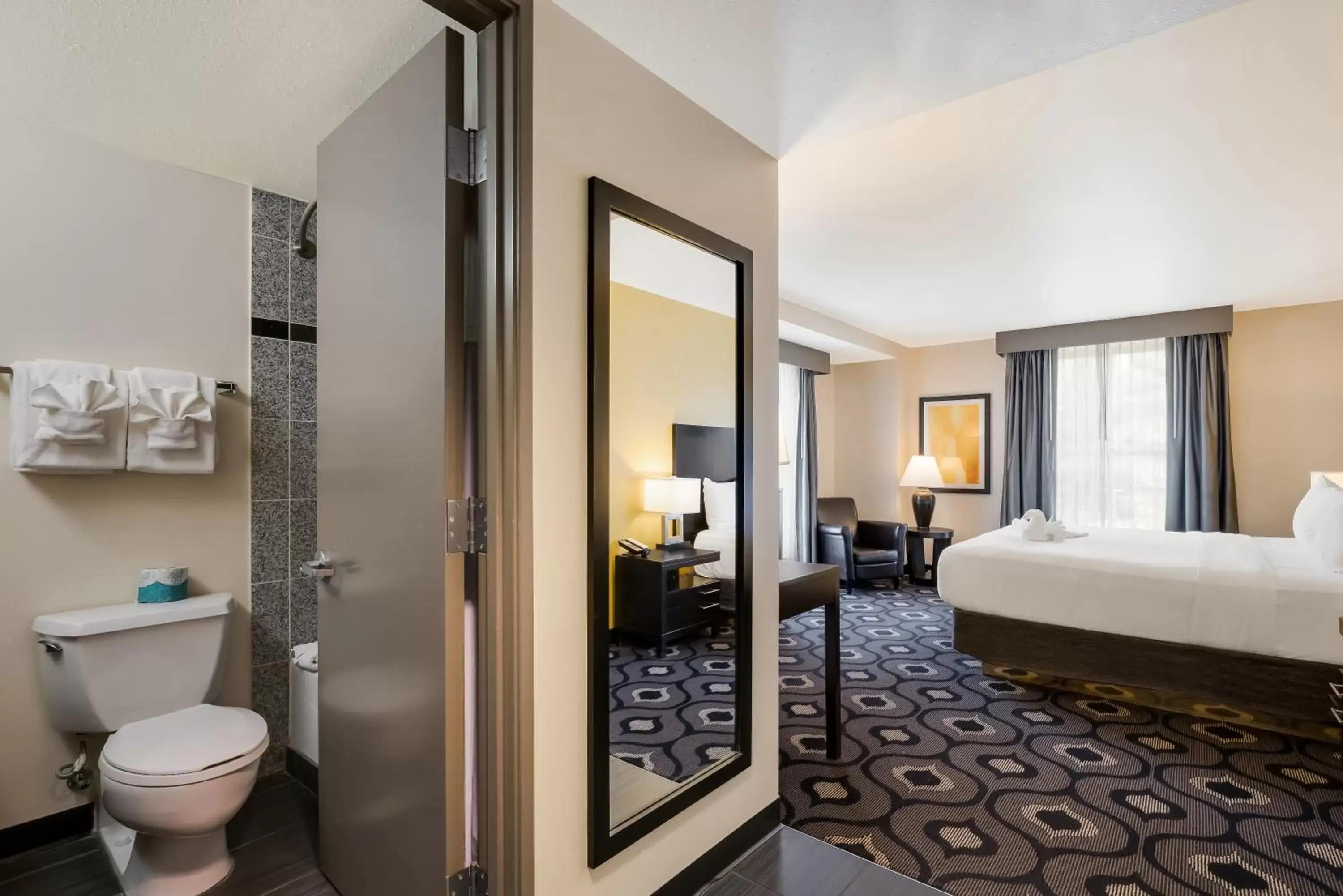 Bed, Bathroom in Grand Z Hotel Casino by Red Lion Hotels