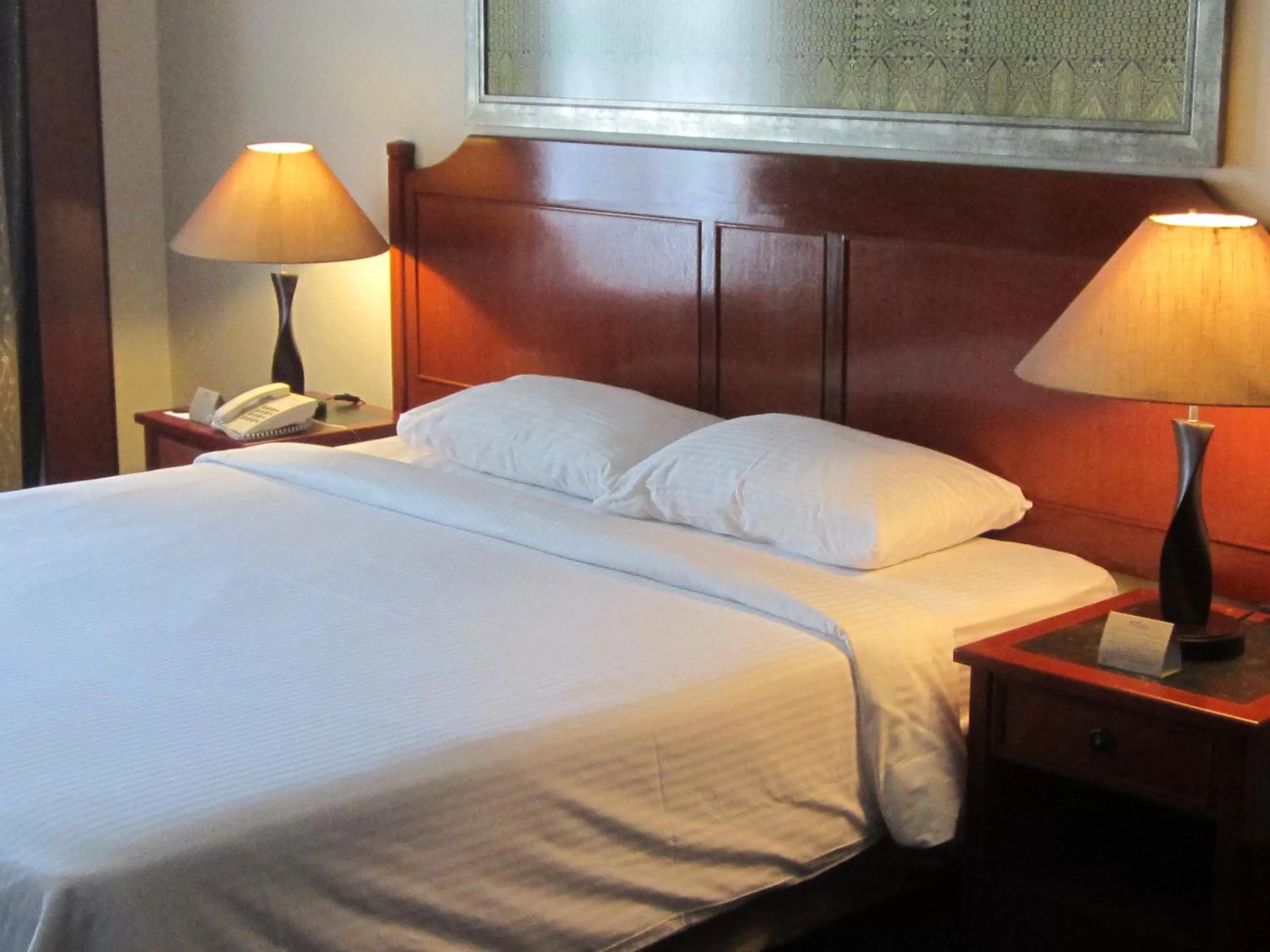 Bed in Rainbow Paradise Beach Resort