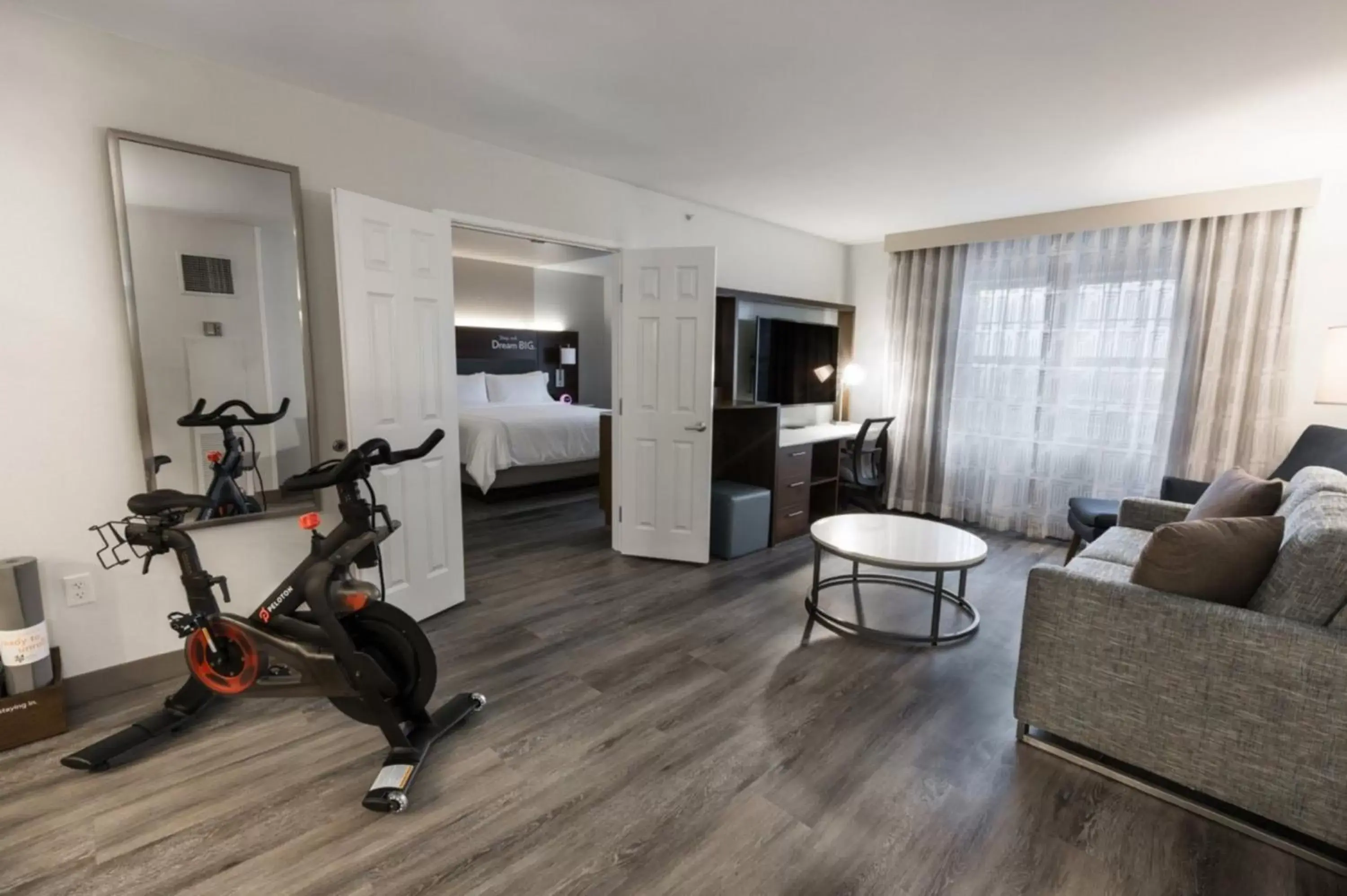 Bedroom, Fitness Center/Facilities in EVEN Hotel Chicago - Tinley Park - Convention Center, an IHG Hotel