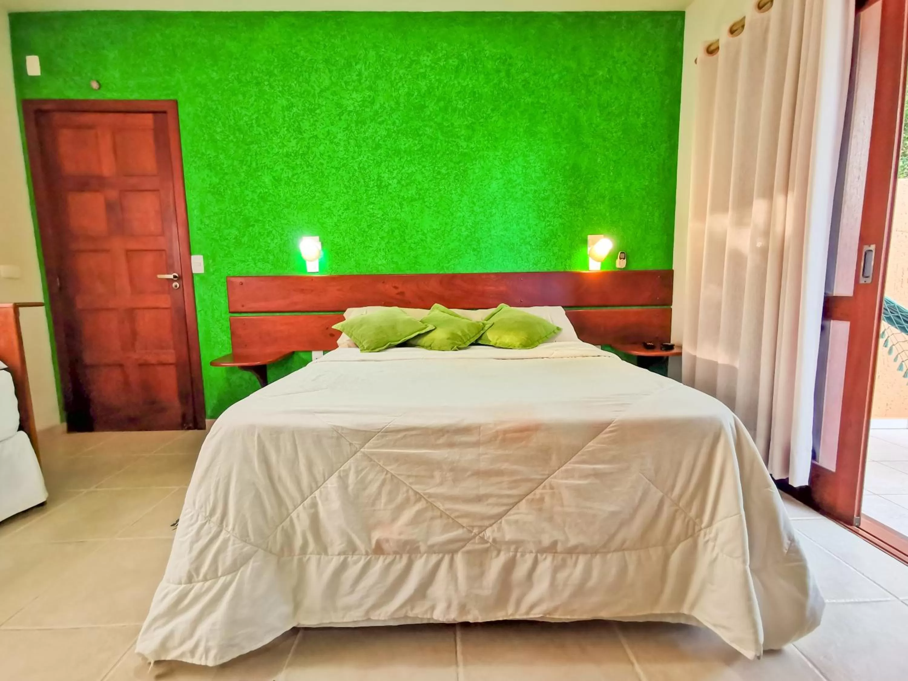 Bed in Pousada Ilha dos Anjos