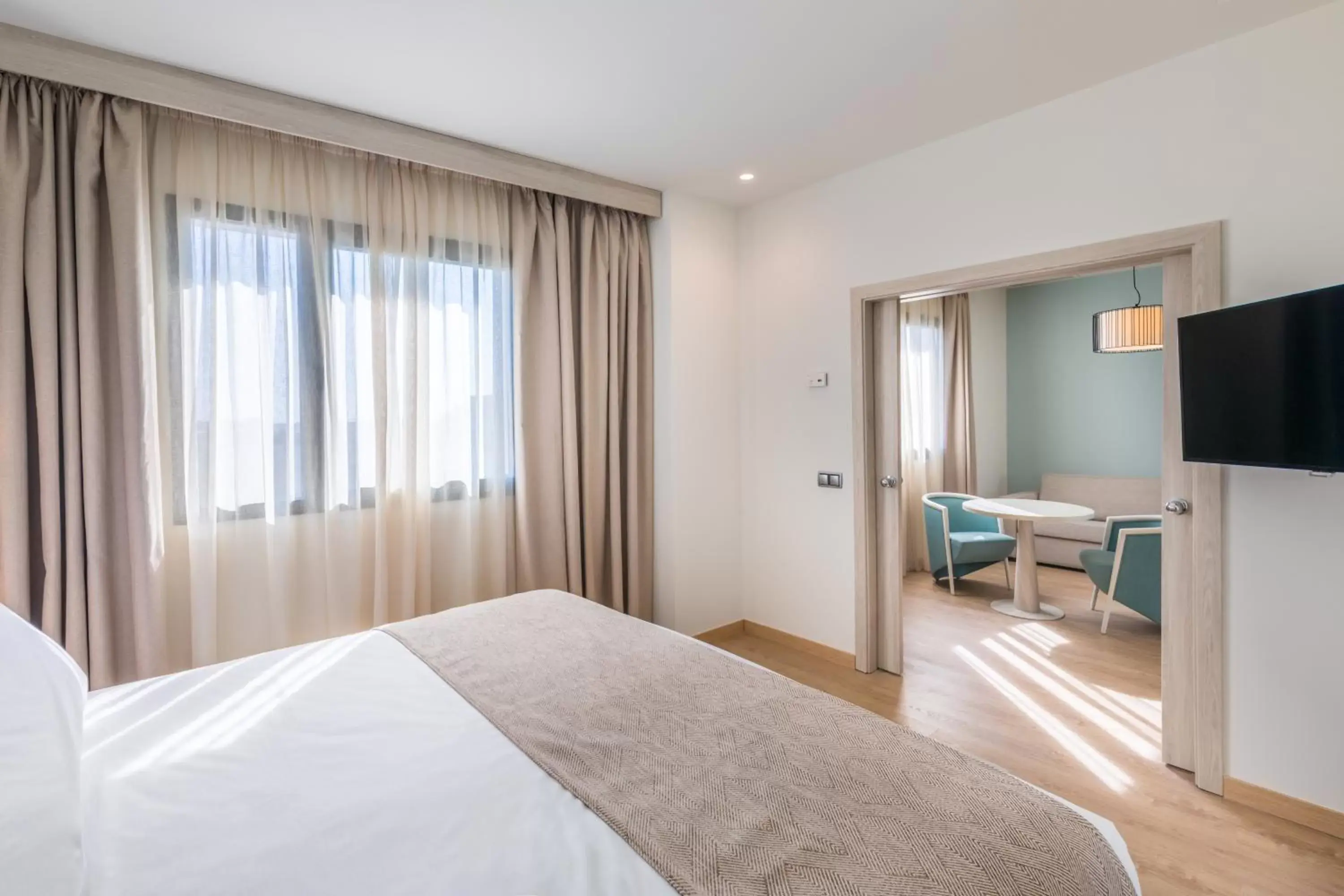 Living room, Bed in Occidental Sevilla Viapol Living room, Bed in Occidental Sevilla Viapol